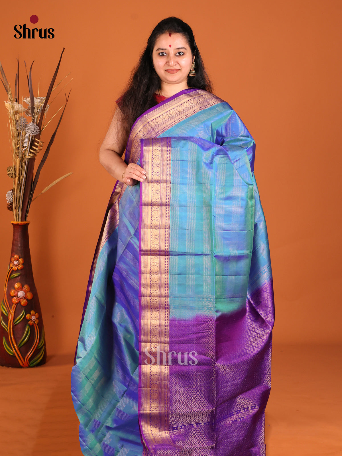 Stunning Blue Soft Silk Saree with zari checks & traditional Purple zari border