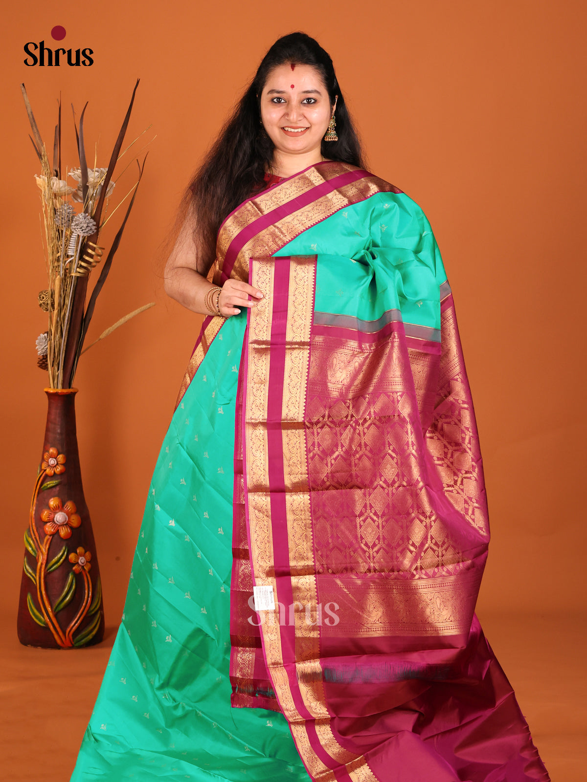 Green & Maroon Kanchipuram Butta design Saree with rettaipet zari border