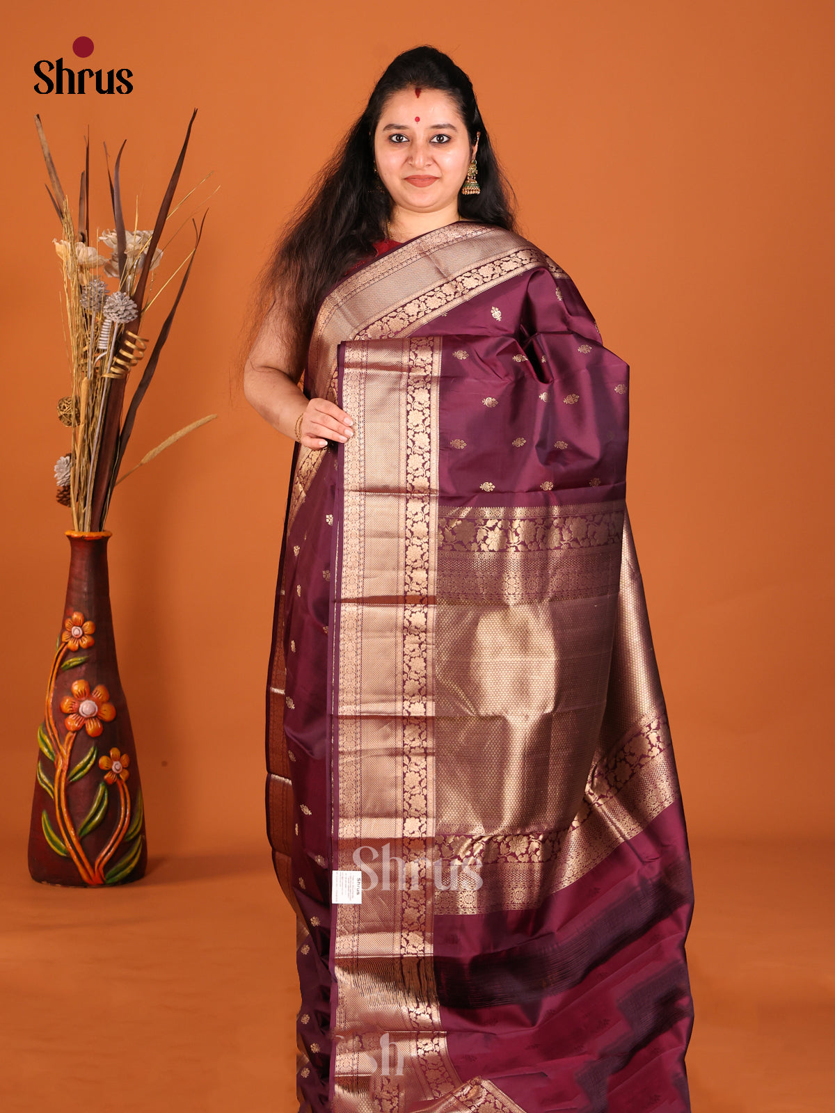 Maroon and gold Kanchipuram Butta design Saree