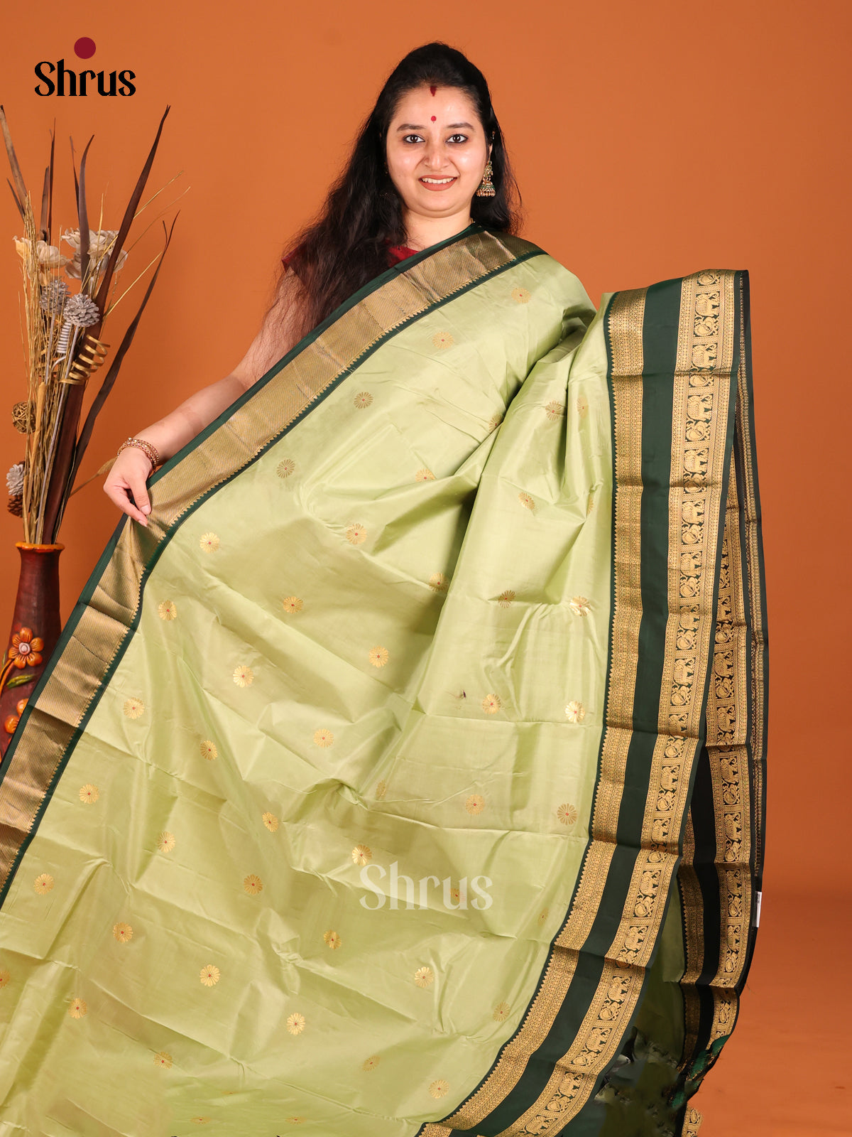 Cream green and mottle green Kanchipuram Butta design Saree -1