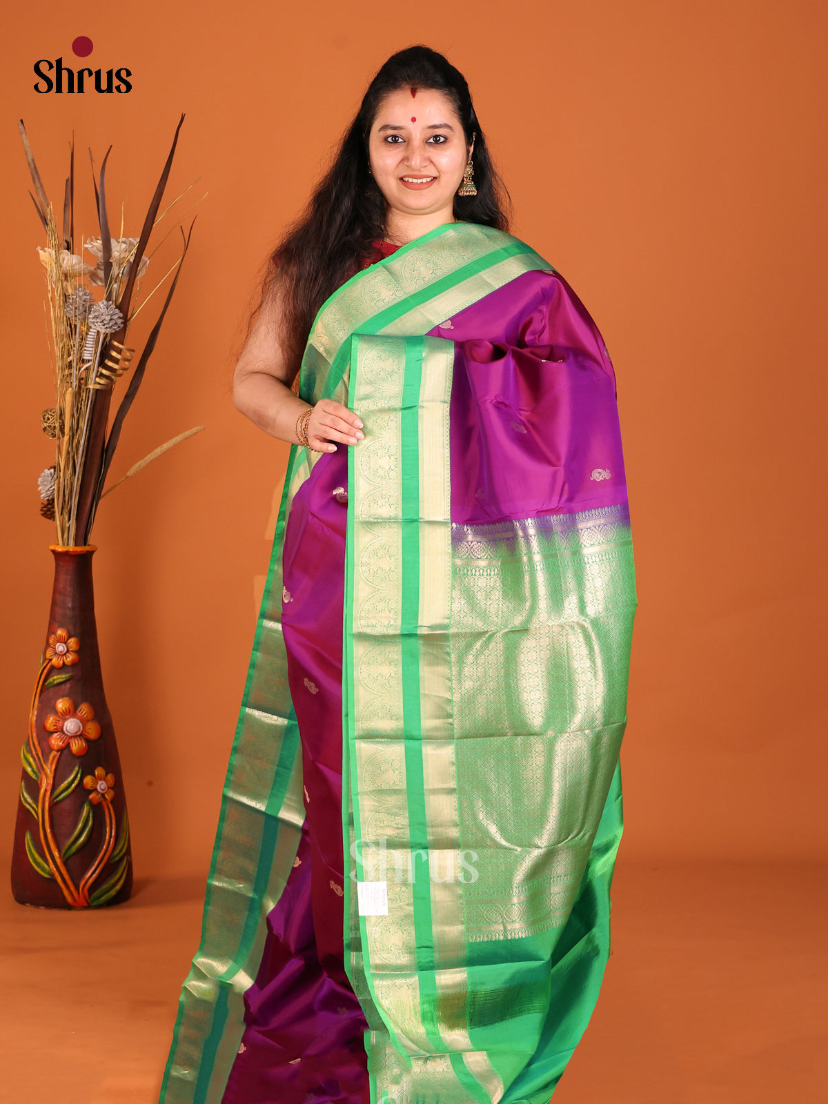 Purple & Green Kanchipuram Butta design Saree with rettaipet zari border