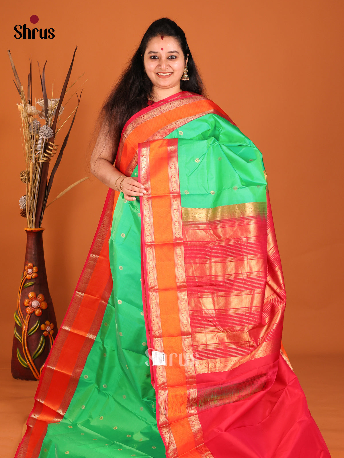 Green & Orange Kanchipuram Butta design Saree with rettaipet zari border