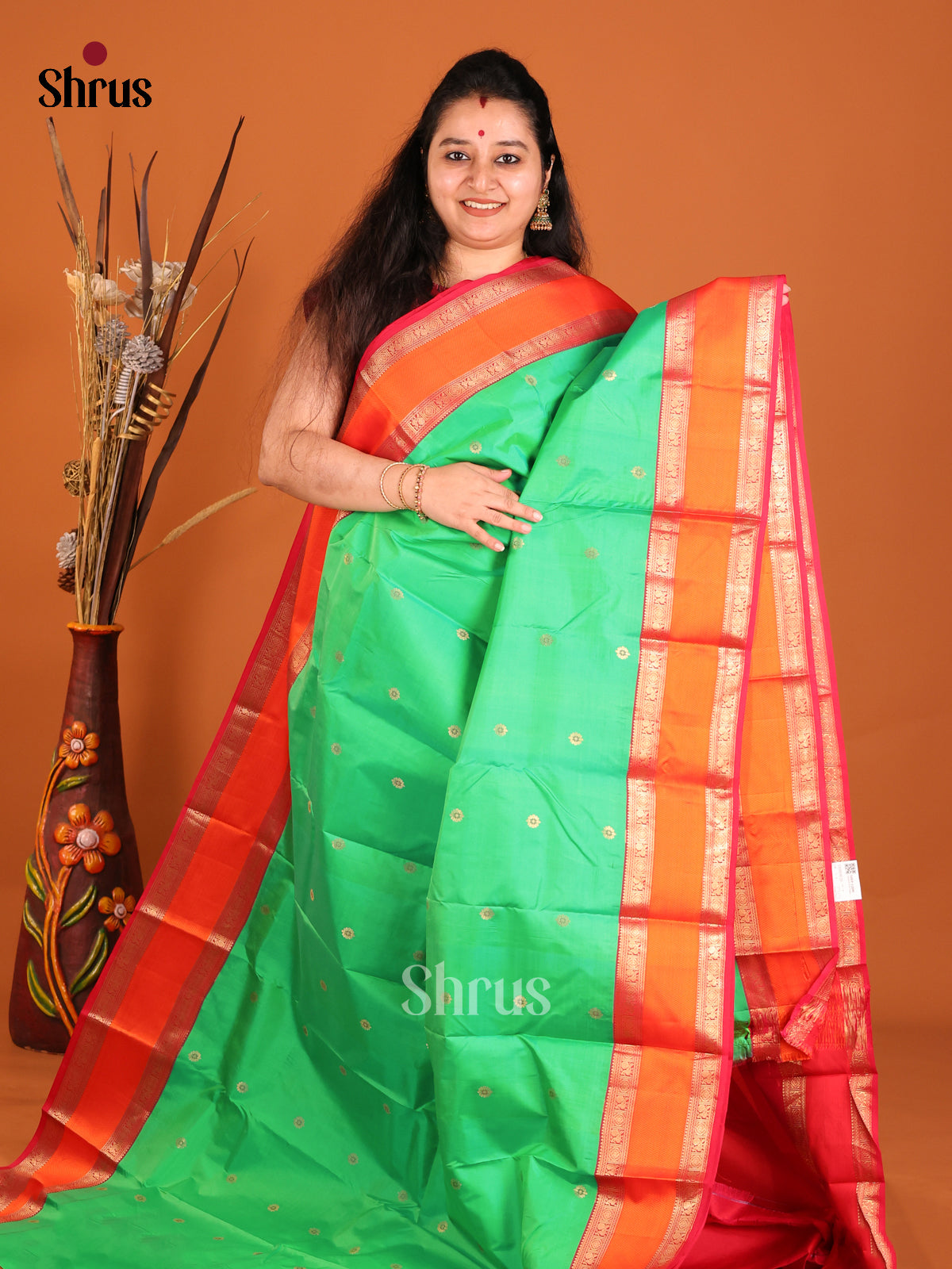 Green & Orange Kanchipuram Butta design Saree with rettaipet zari border -1