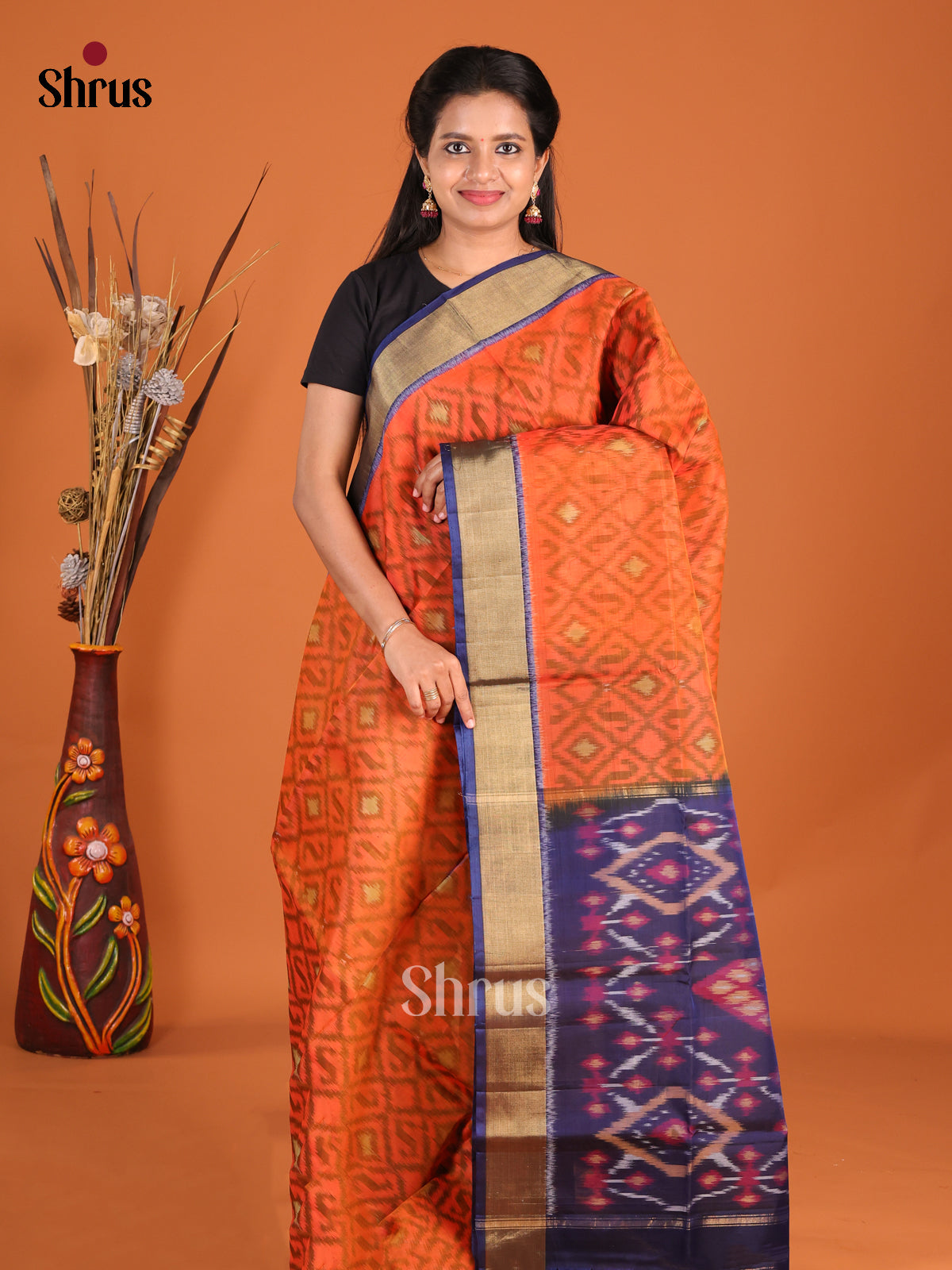 Vibrant Orange Silk Cotton Saree with Pochampally Design & Blue Zari Border