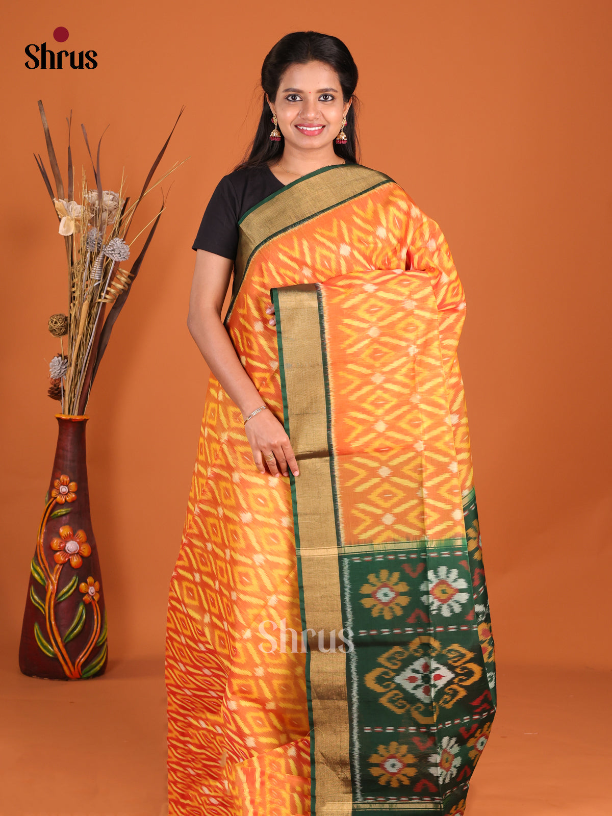 Radiant Orange Pochampally Silk Cotton Saree with Green Ikat Pallu