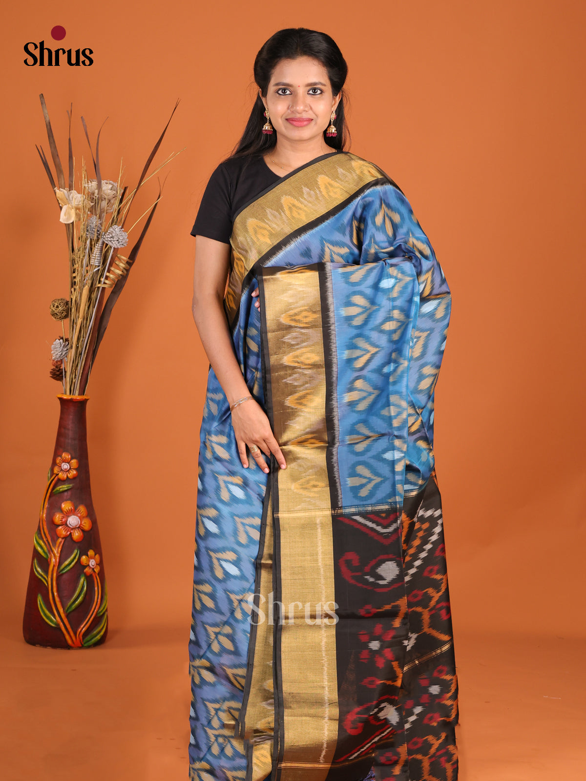 Serene Blue Pochampally Silk Cotton Saree with Ikat Patterns & Black Pallu