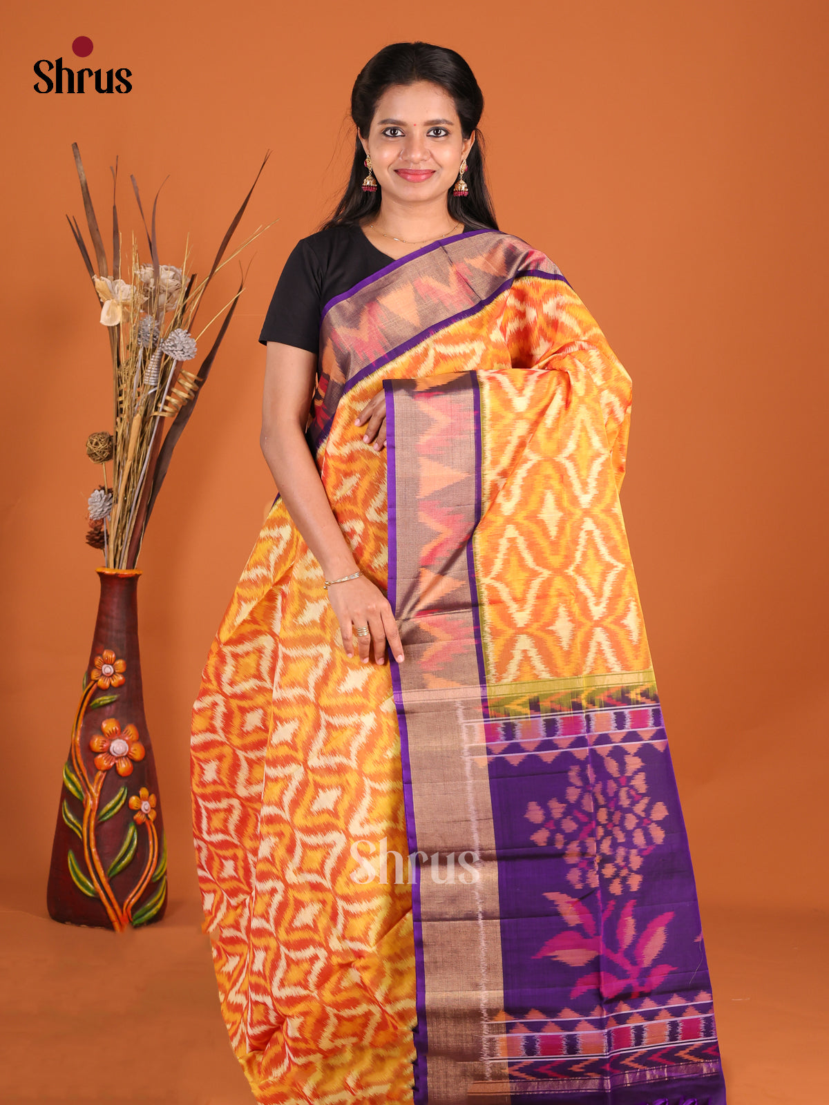 Pretty Mustard Pochampally Silk Cotton Saree with Violet Ikat Border