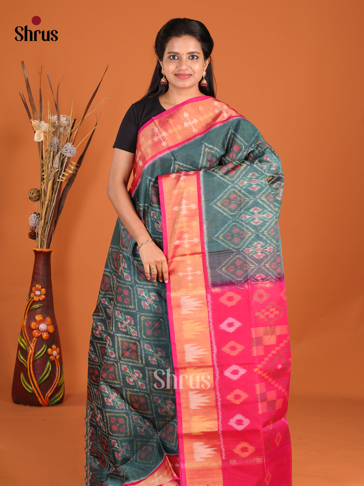 Classic Green Pochampally Silk Cotton Saree with Pink Ikat Border