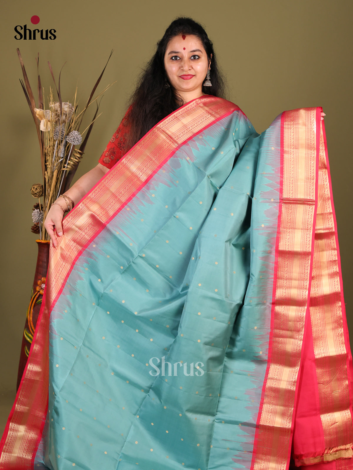 Sheeny Pastel Blue Soft Silk Saree with Zari Buttas & Orangish Pink rich zari border -1