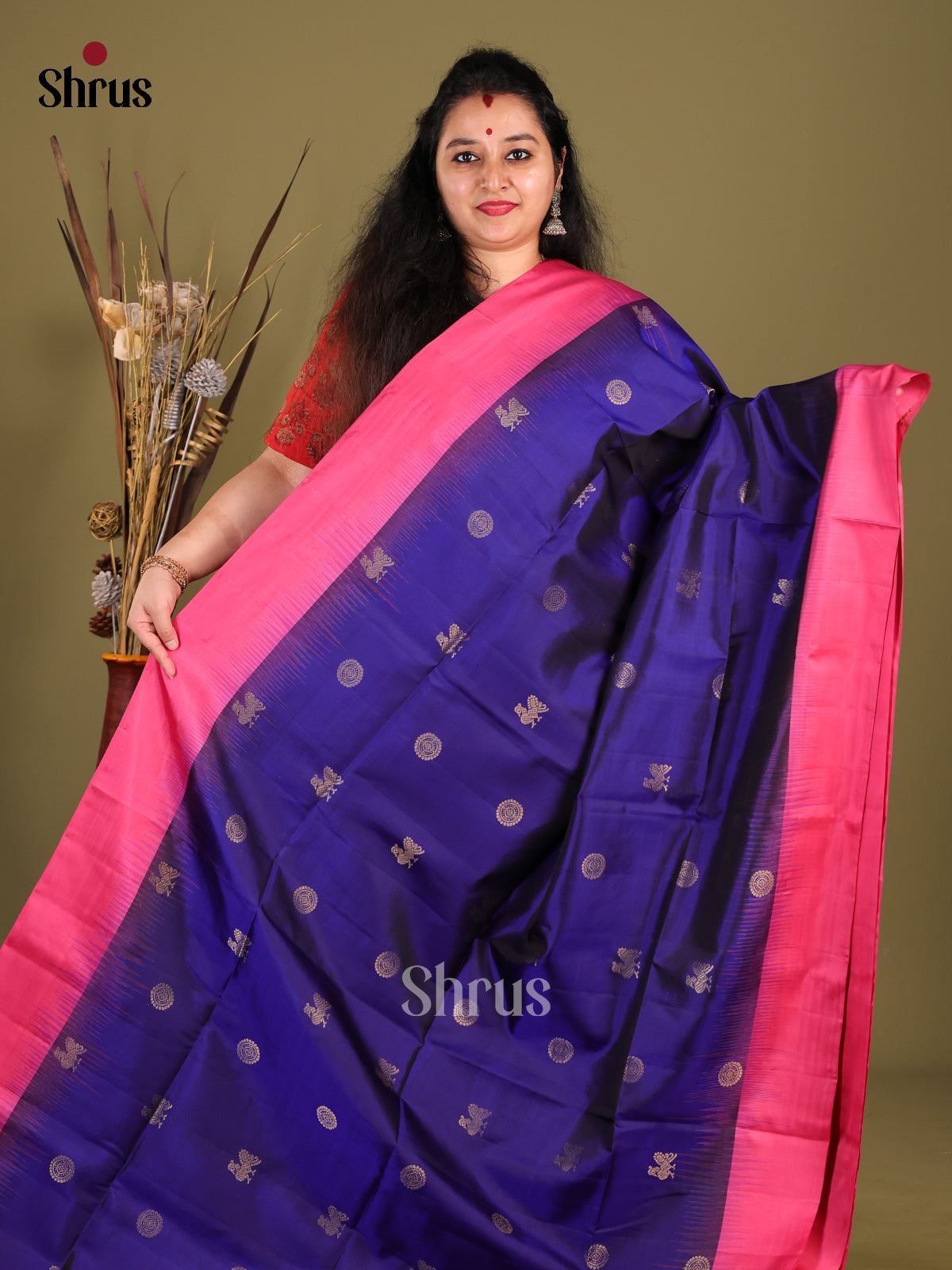 Blue & Pink Soft Silk Saree gleams with peacock , floral buttas
