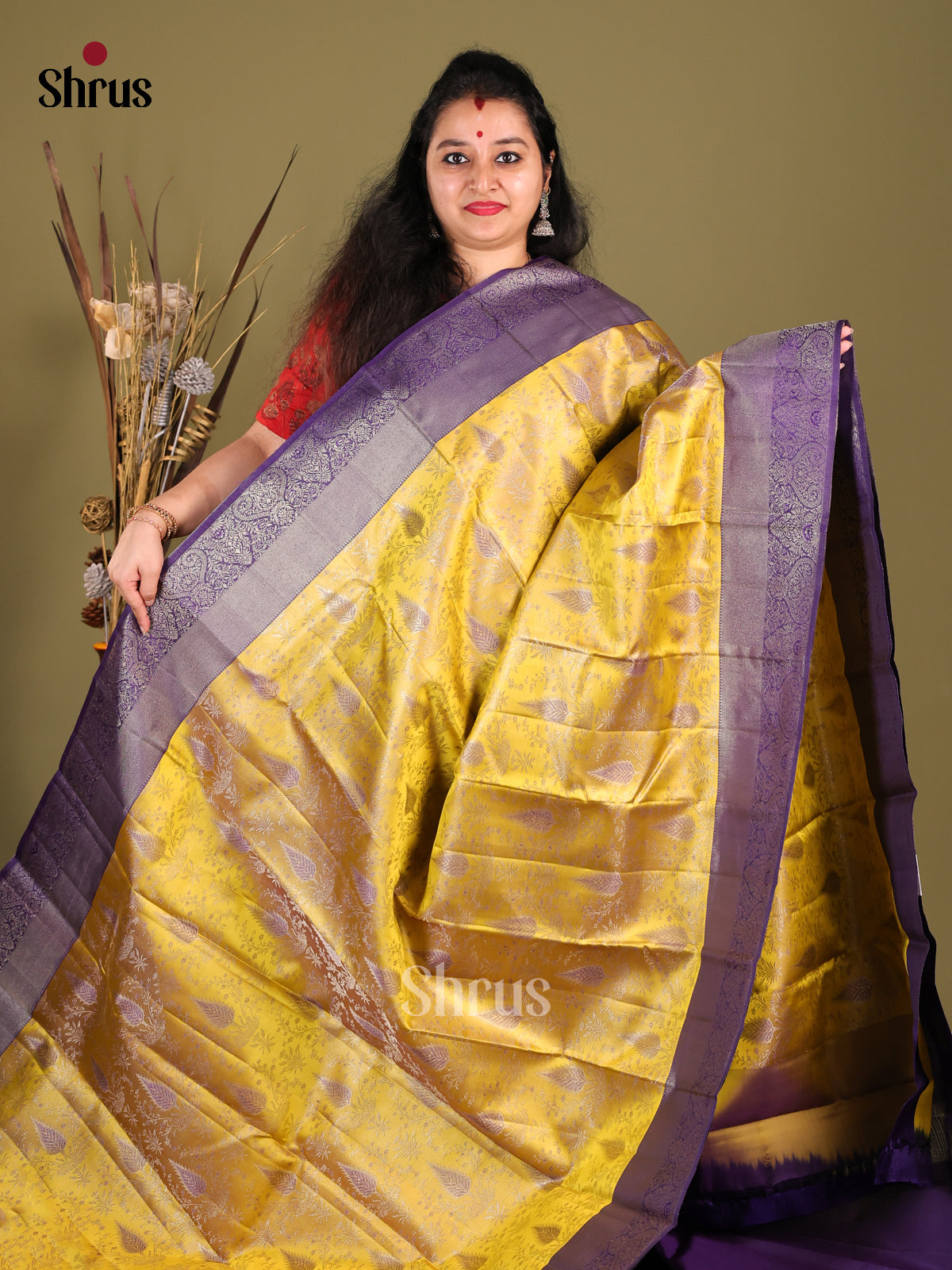 Lustrous Yellow Kanjivaram silk Saree with floral nestling brocade & Violet Border -1