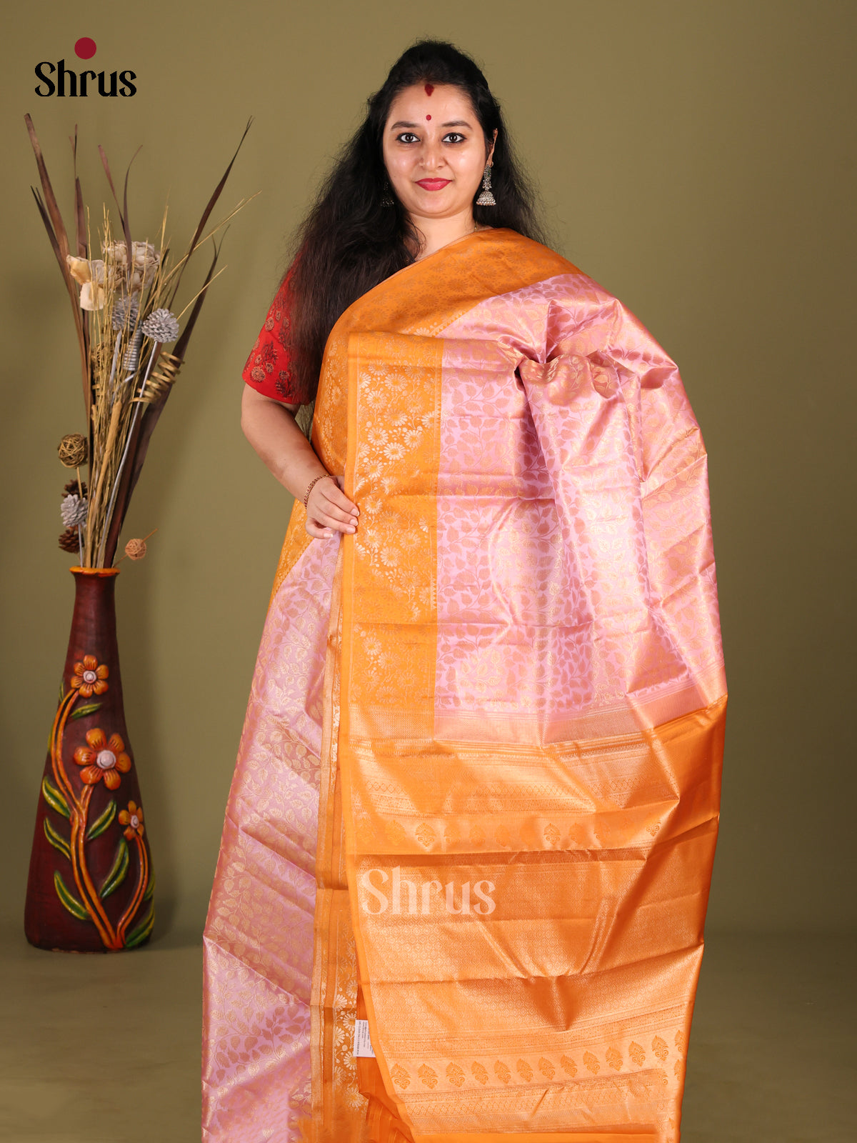 Elegant Pink Kanchipuram silk Saree with zari floral nestling brocade & Orange Border