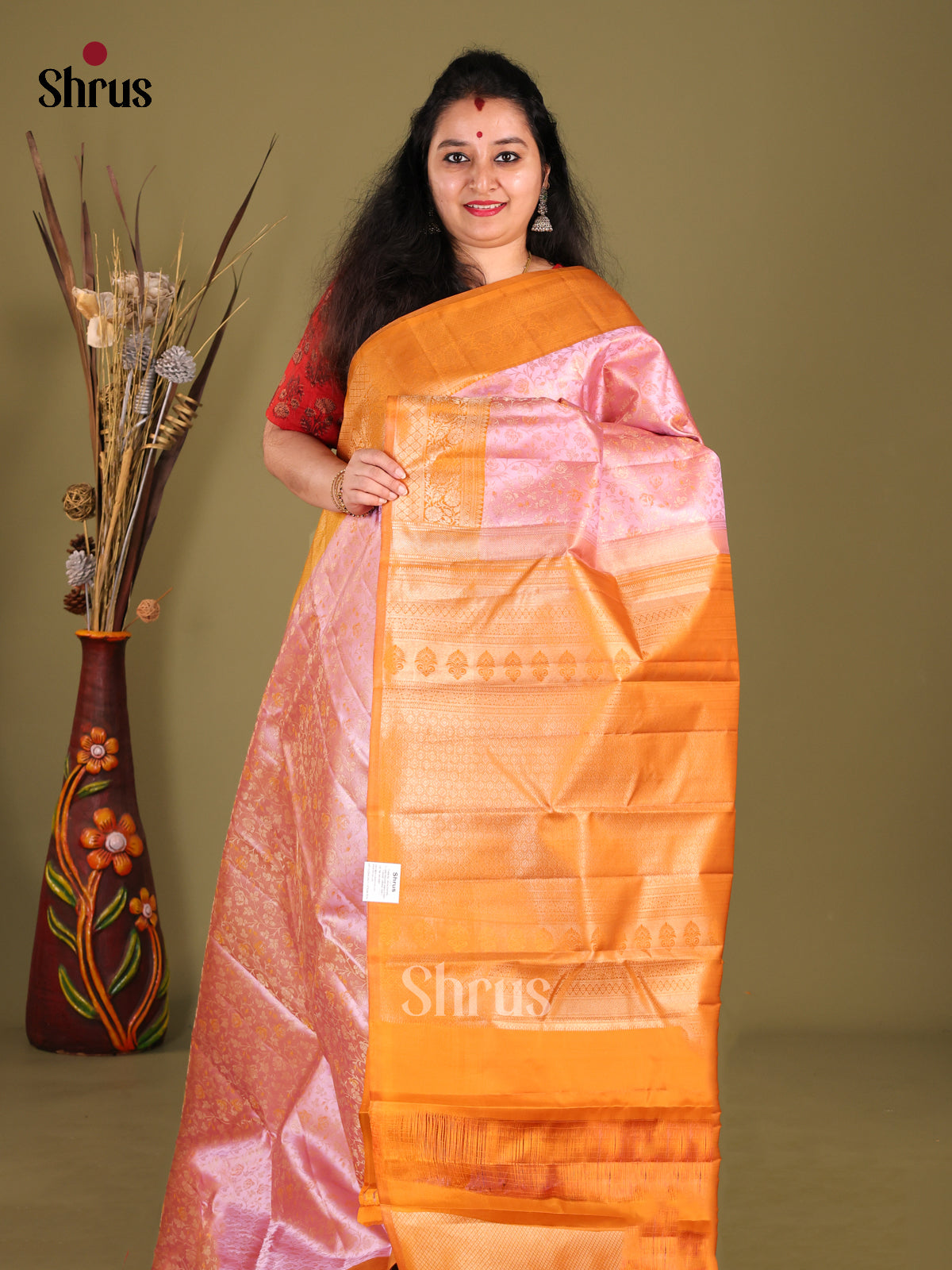 Regal Pink Kanjivaram silk Saree with woven floral nestling brocade & Brick Border