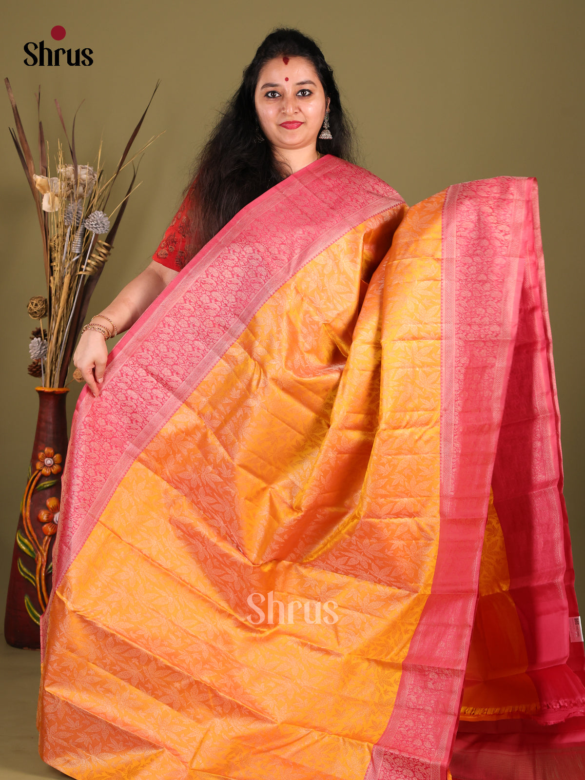 Luminous Orange Kanchipuram silk Saree with floral nestling brocade & Pink Zari Border -1