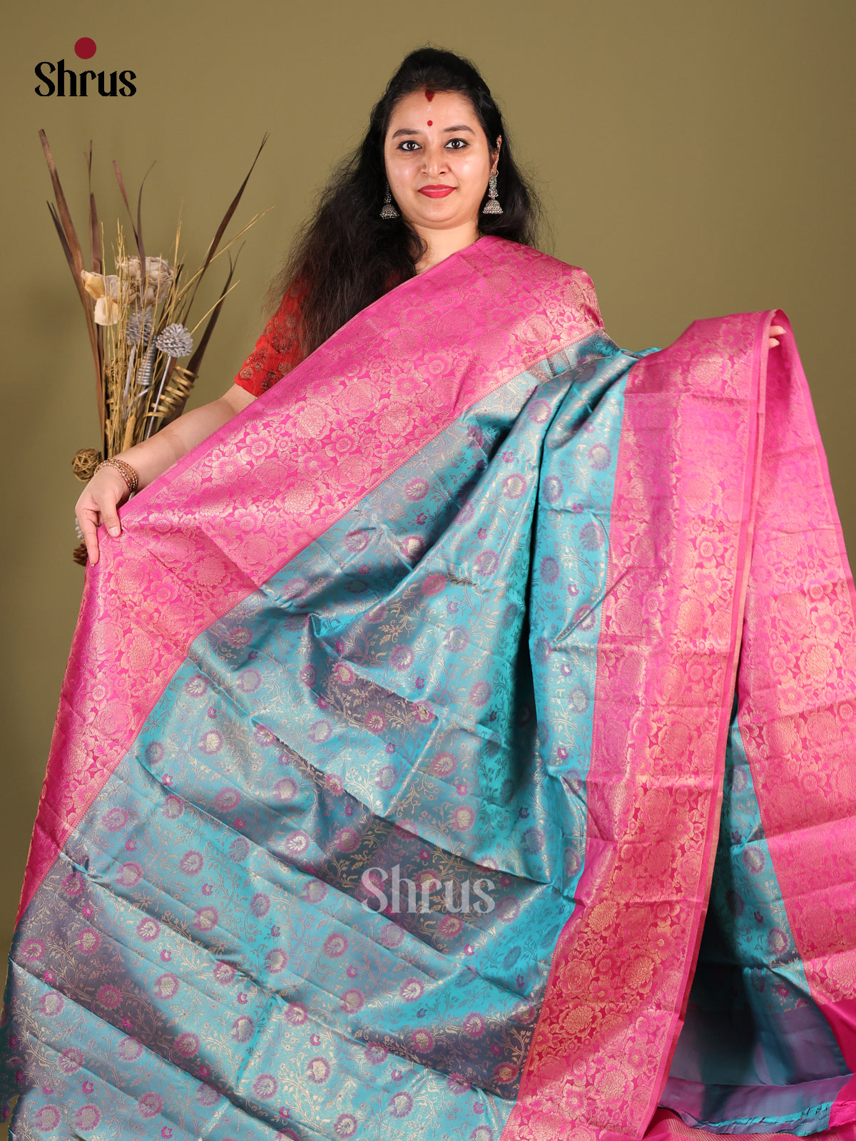 Serene Blue Kanjivaram Saree with floral nestling brocade & Pink Border -1