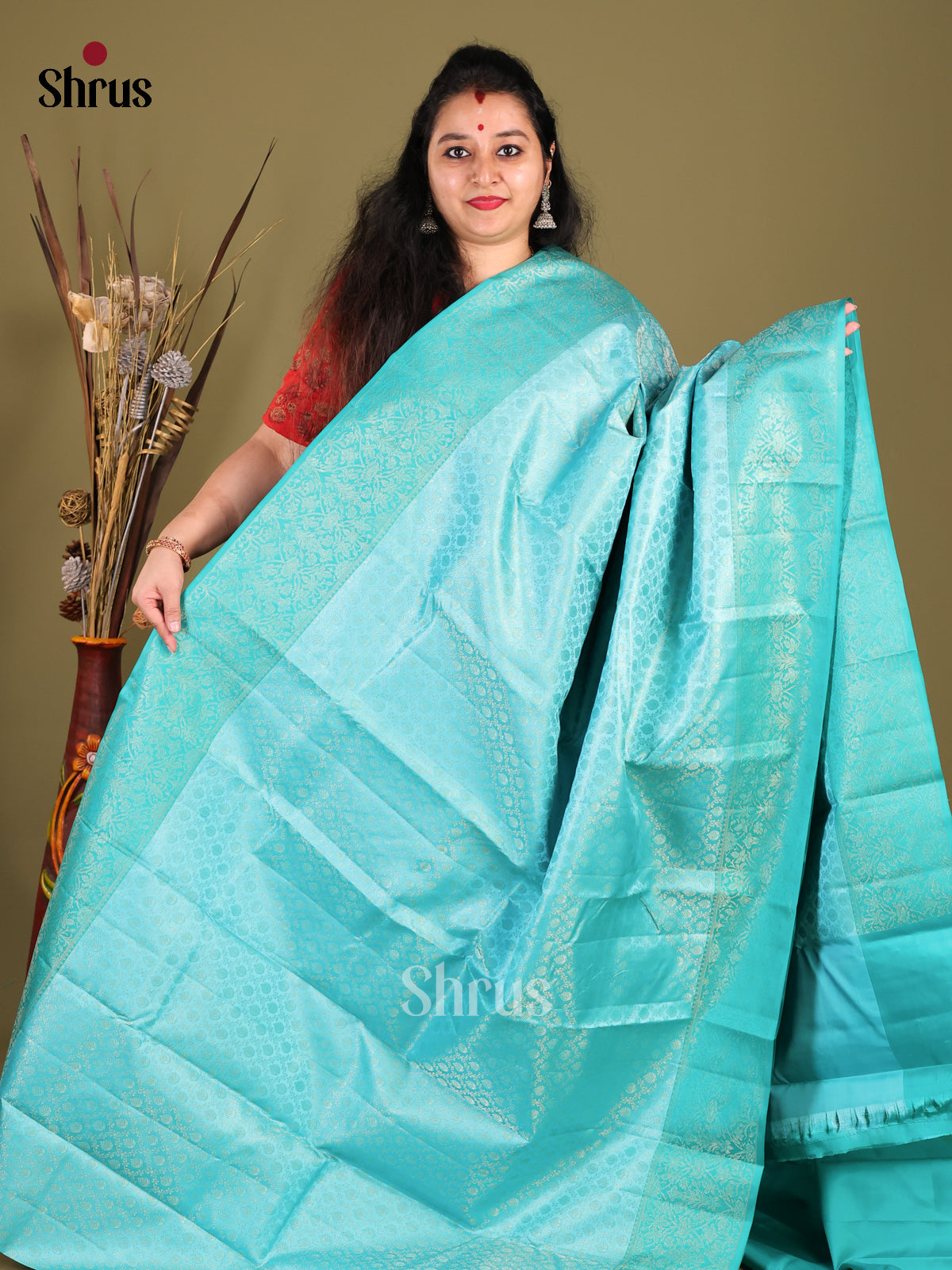 Dazzling Sky Blue Kanchipuram silk Saree with zari floral brocade