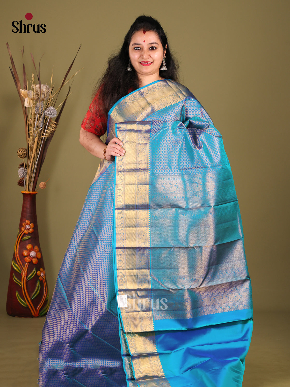Dazzling Blue Kanjivaram silk Saree with golden zari brocade & Traditional Self Border