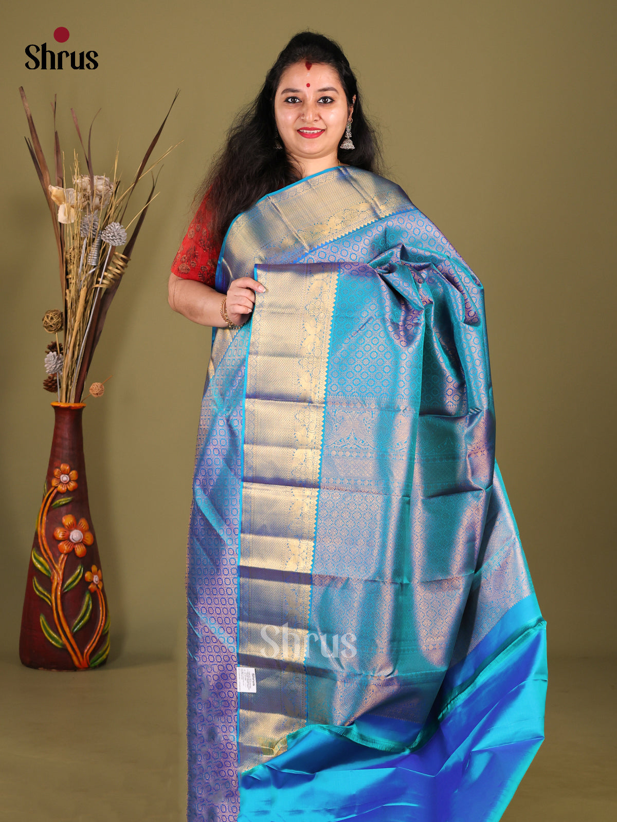 Timeless Blue Kanjivaram Saree with Intricately woven zari brocade & Traditional Border