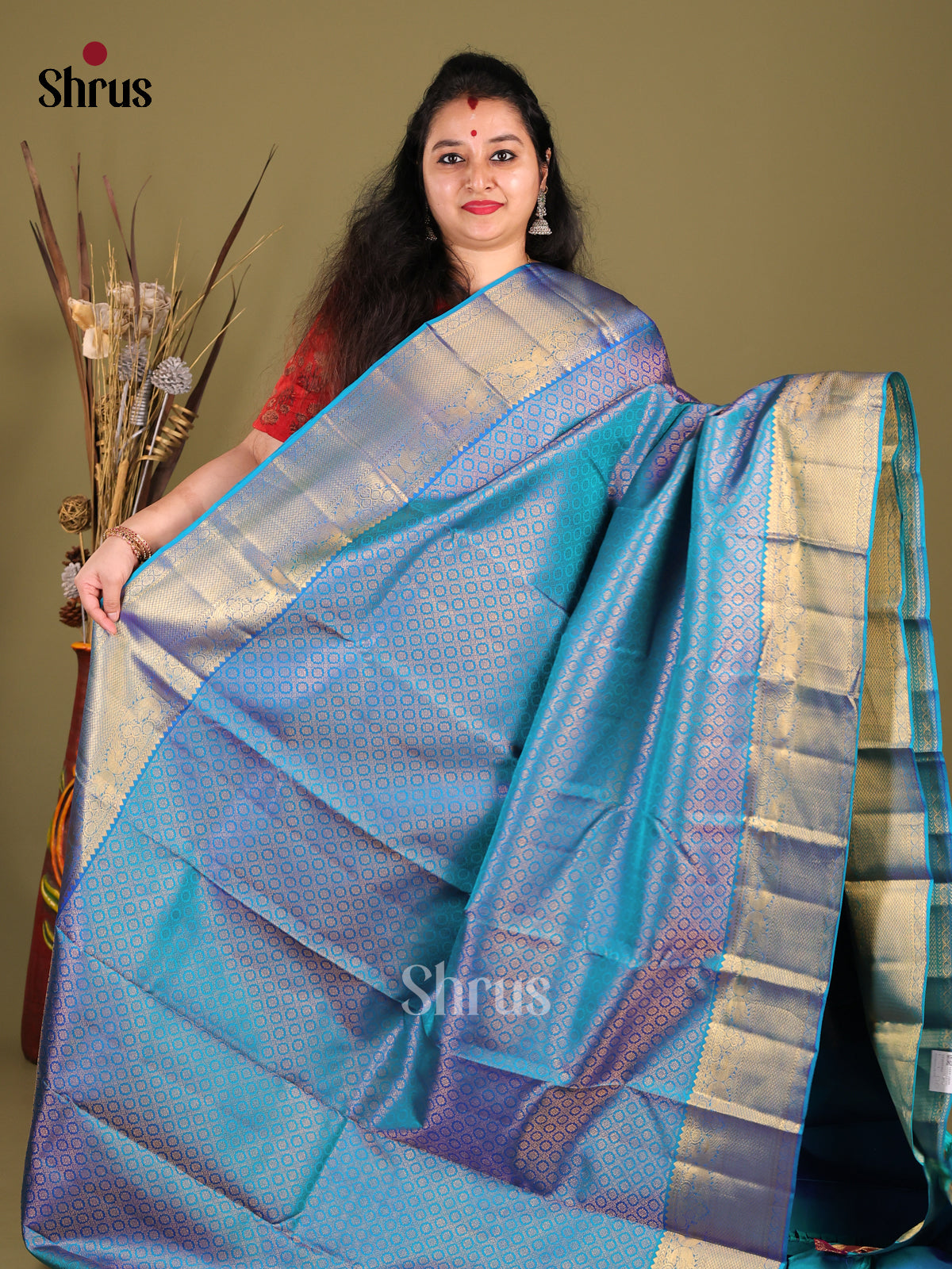 Timeless Blue Kanjivaram Saree with Intricately woven zari brocade & Traditional Border -1