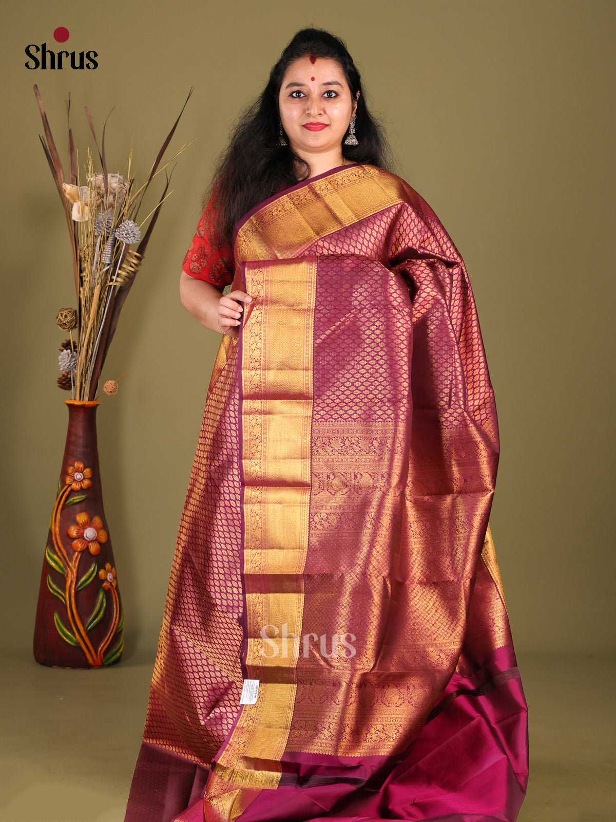 Classic Purple Kanchipuram Saree with intricately woven golden zari brocade