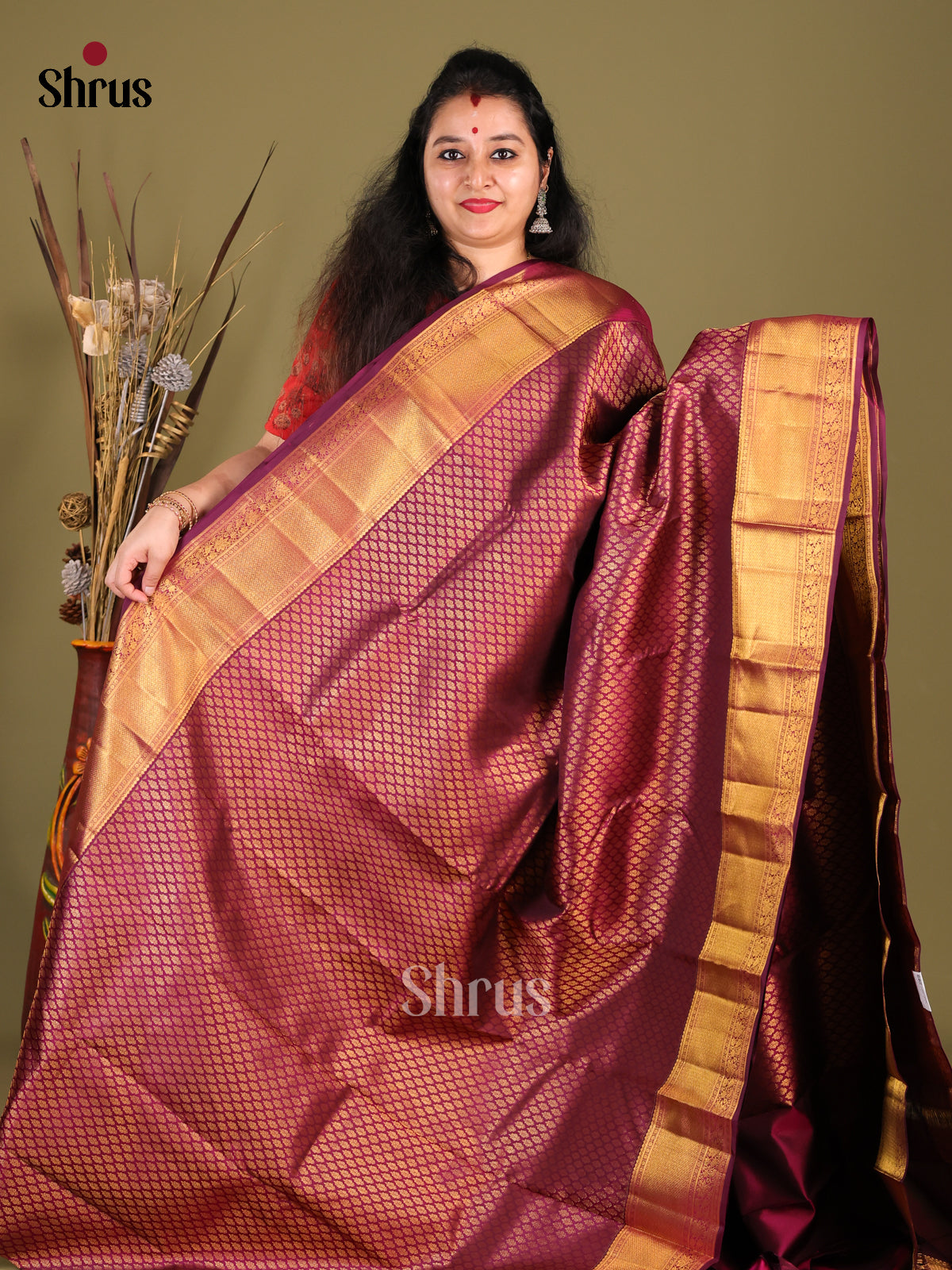 Classic Purple Kanchipuram Saree with intricately woven golden zari brocade