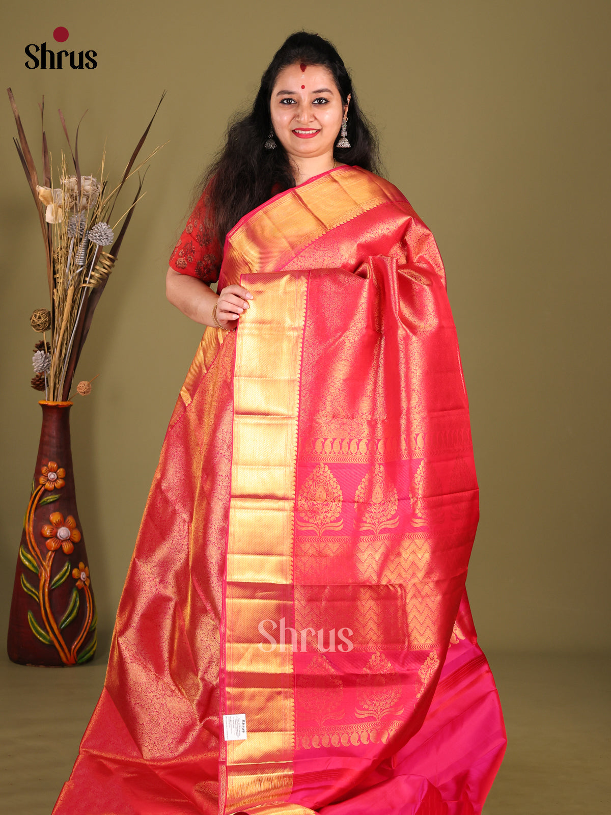 Cute Pink Kanjivaram Saree with floral nestling brocade & Self Zari Woven Border
