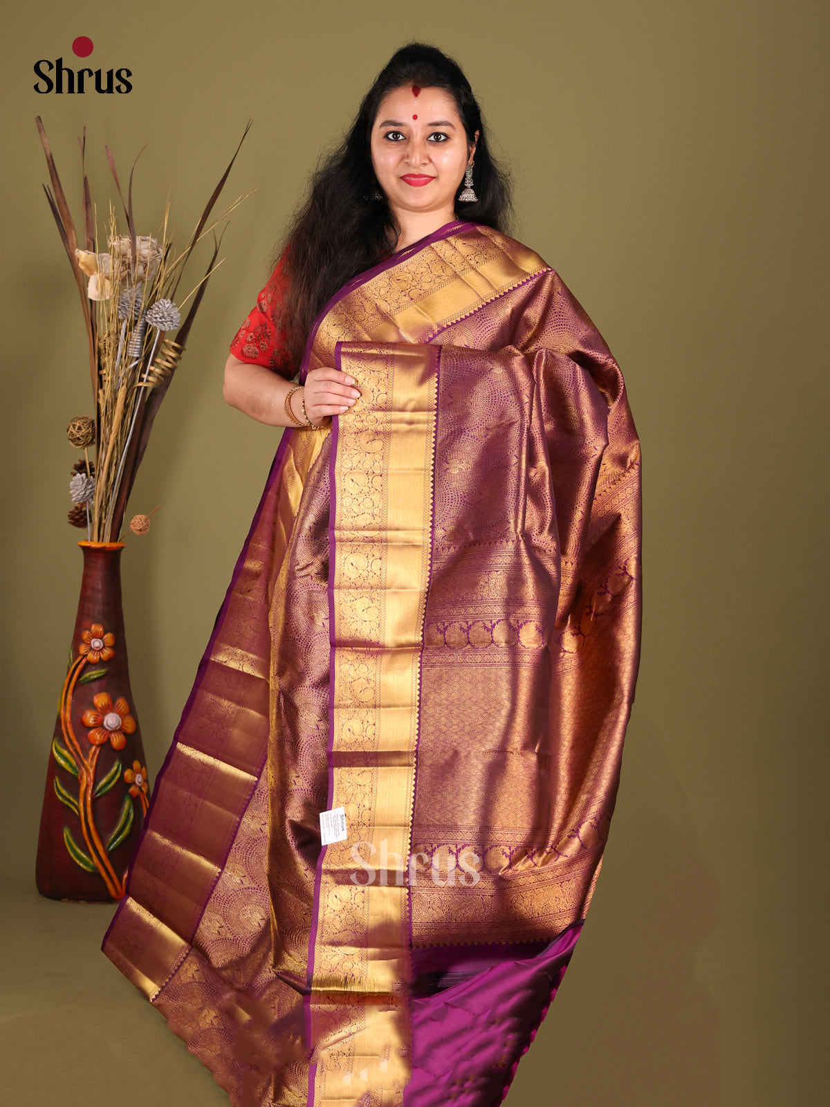 Regal purple Kanjivaram Saree with rich golden brocade pattern & Zari Woven Border