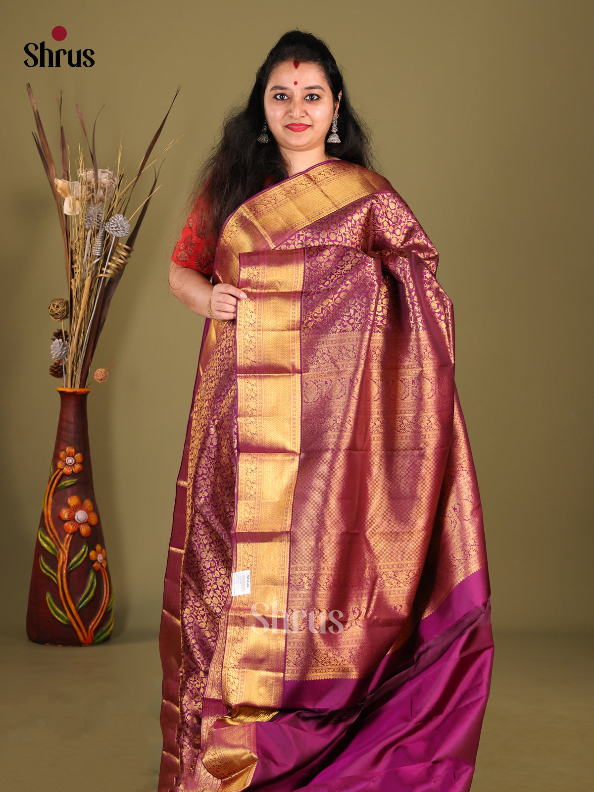 Stunning Purple Kanjivaram silk Saree with floral nestling brocade & Self Zari Border
