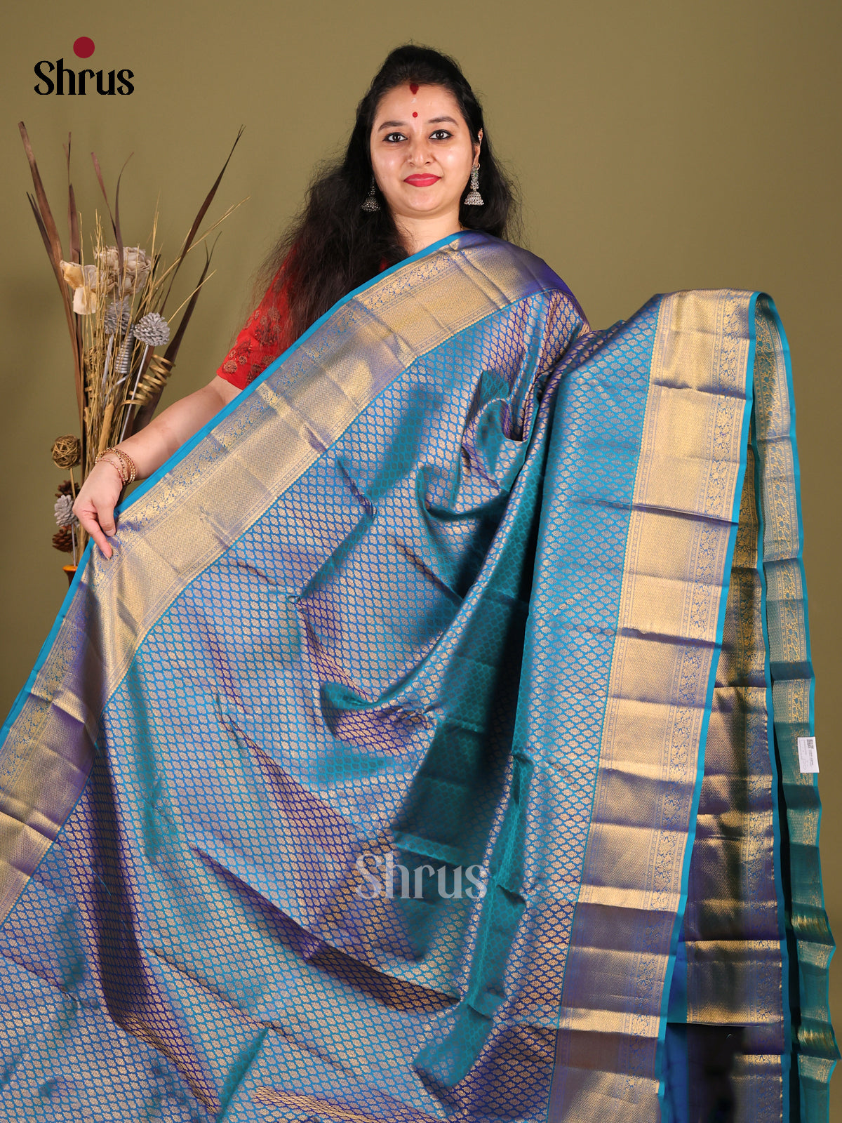 Vibrant Blue Kanchipuram Saree with rich Golden BRocade Body & Zari Woven Border -1