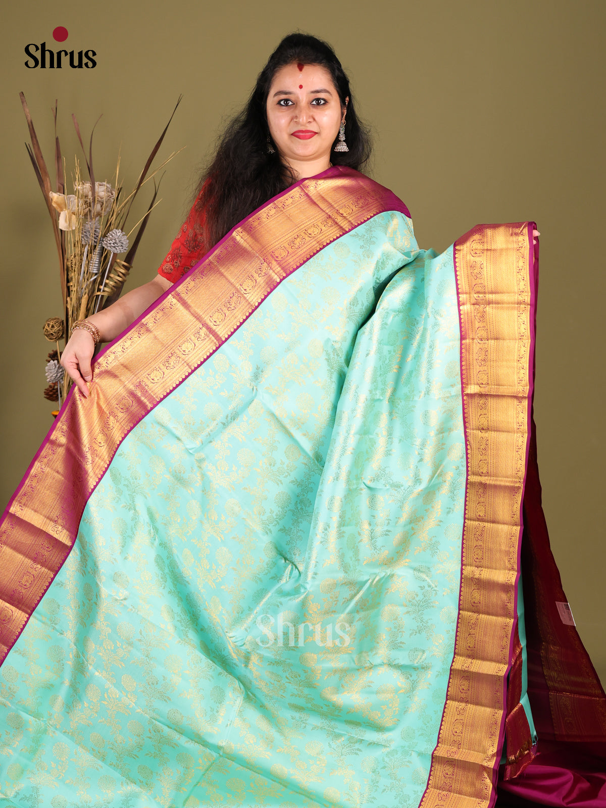Artisanal Pastel Blue Kanchipuram Saree with Golden floral nestling brocade & Purple Border -1
