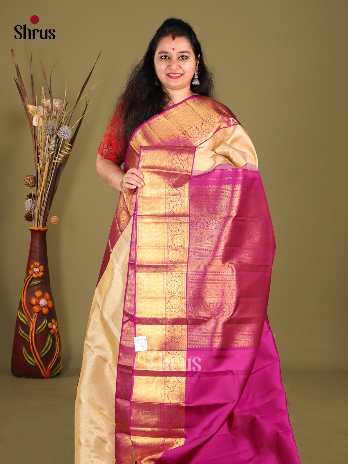 Gorgeous Cream Kanjivaram silk Saree with Zari Woven Brocade & rich Purple border