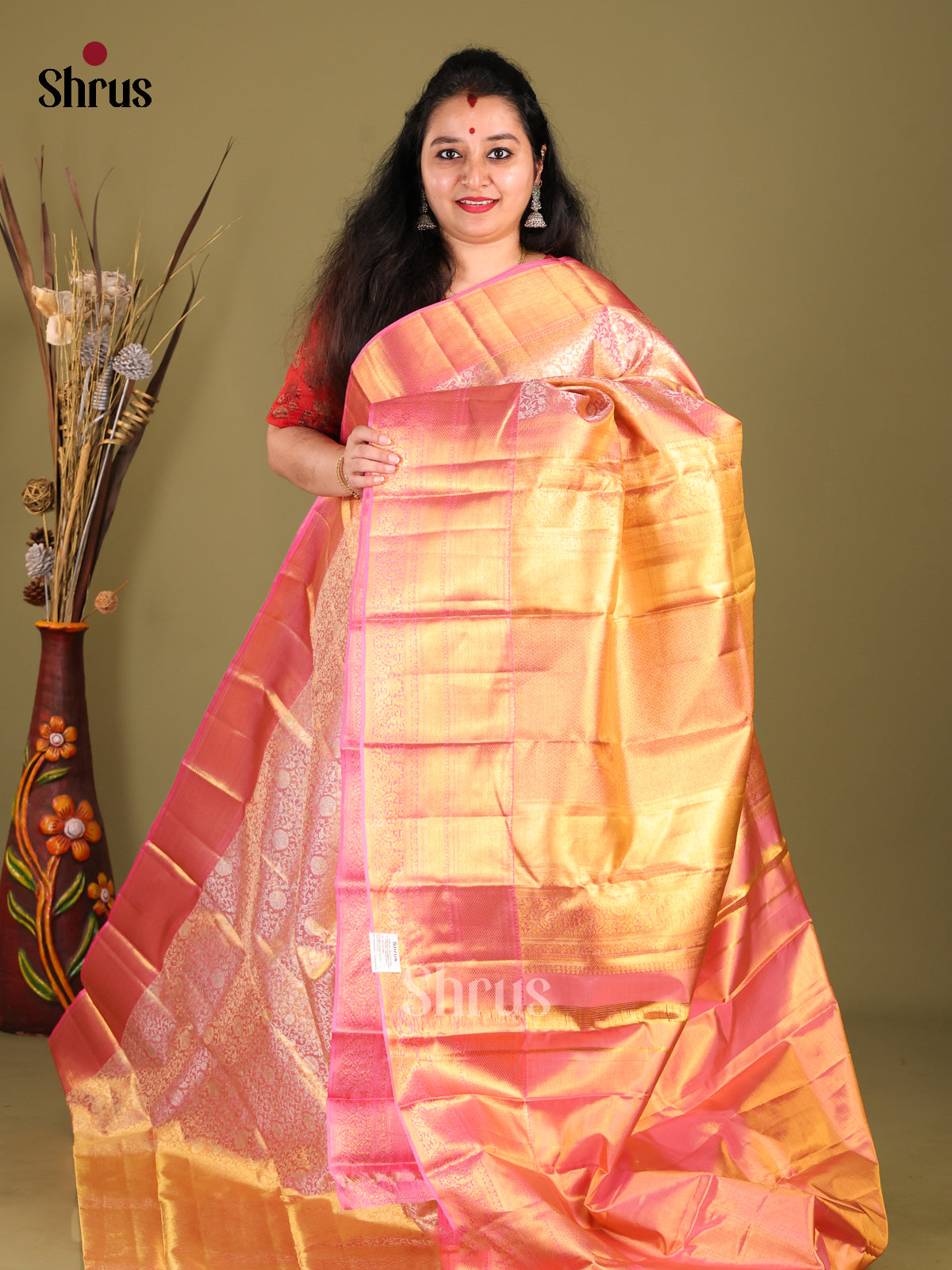 Timeless Pink Kanchipuram silk Saree woven with rich Zari Brocade & self zari border