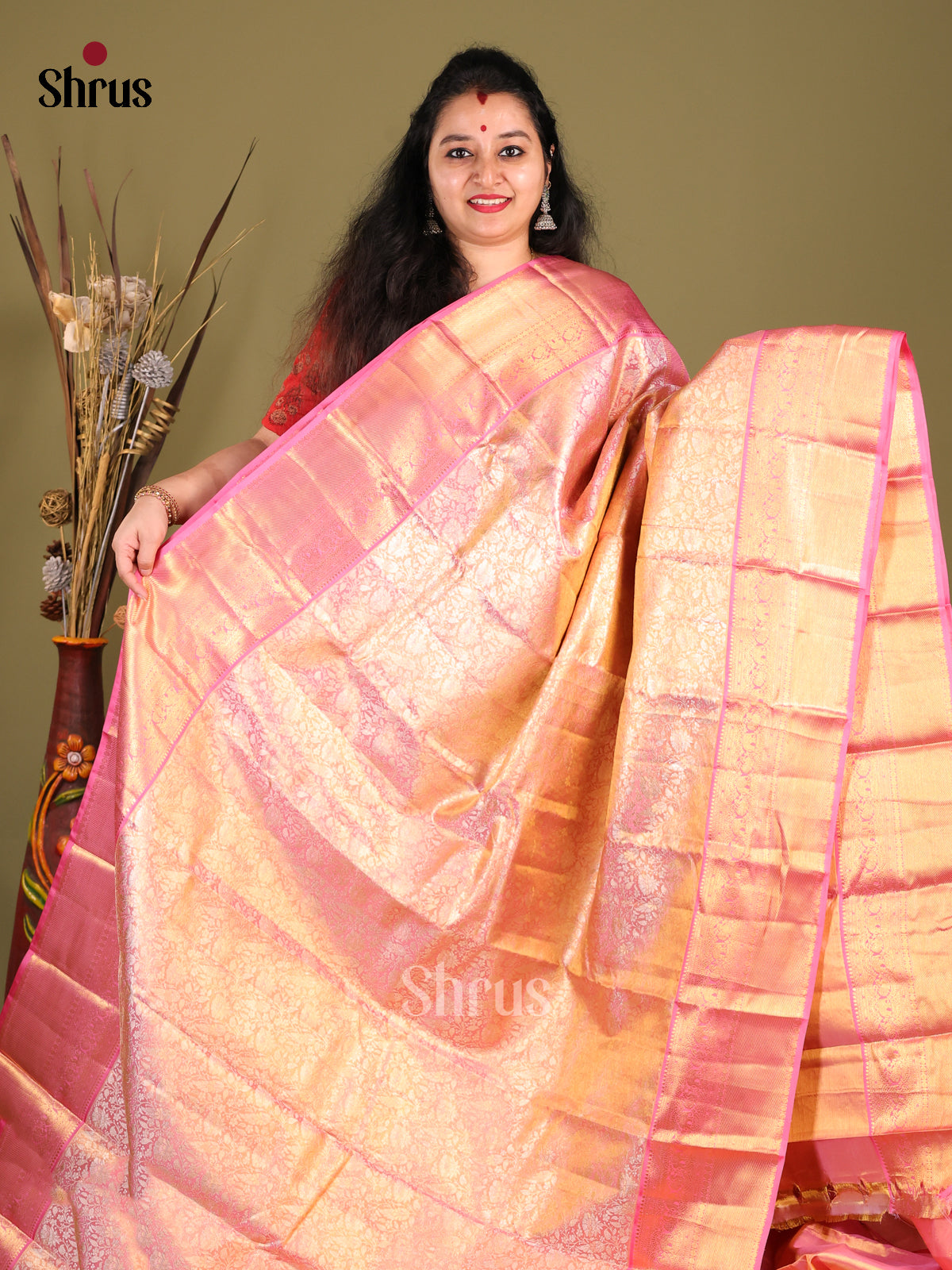 Shimmering Pink Kanjivaram Saree with zari floral nestling brocade - Shop on Shrus.com