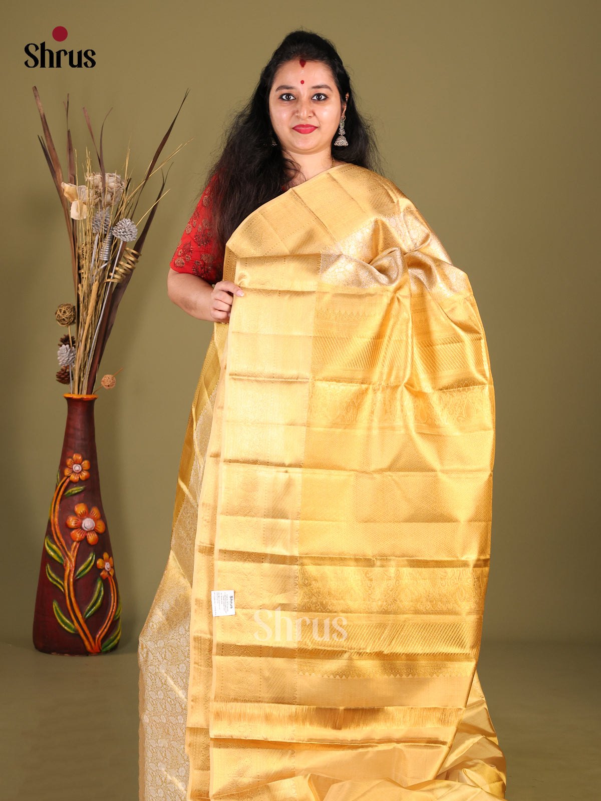 Dazzling Gold Kanchipuram Saree with Golden floral nestling brocade & Zari Border - Shop on Shrus.com