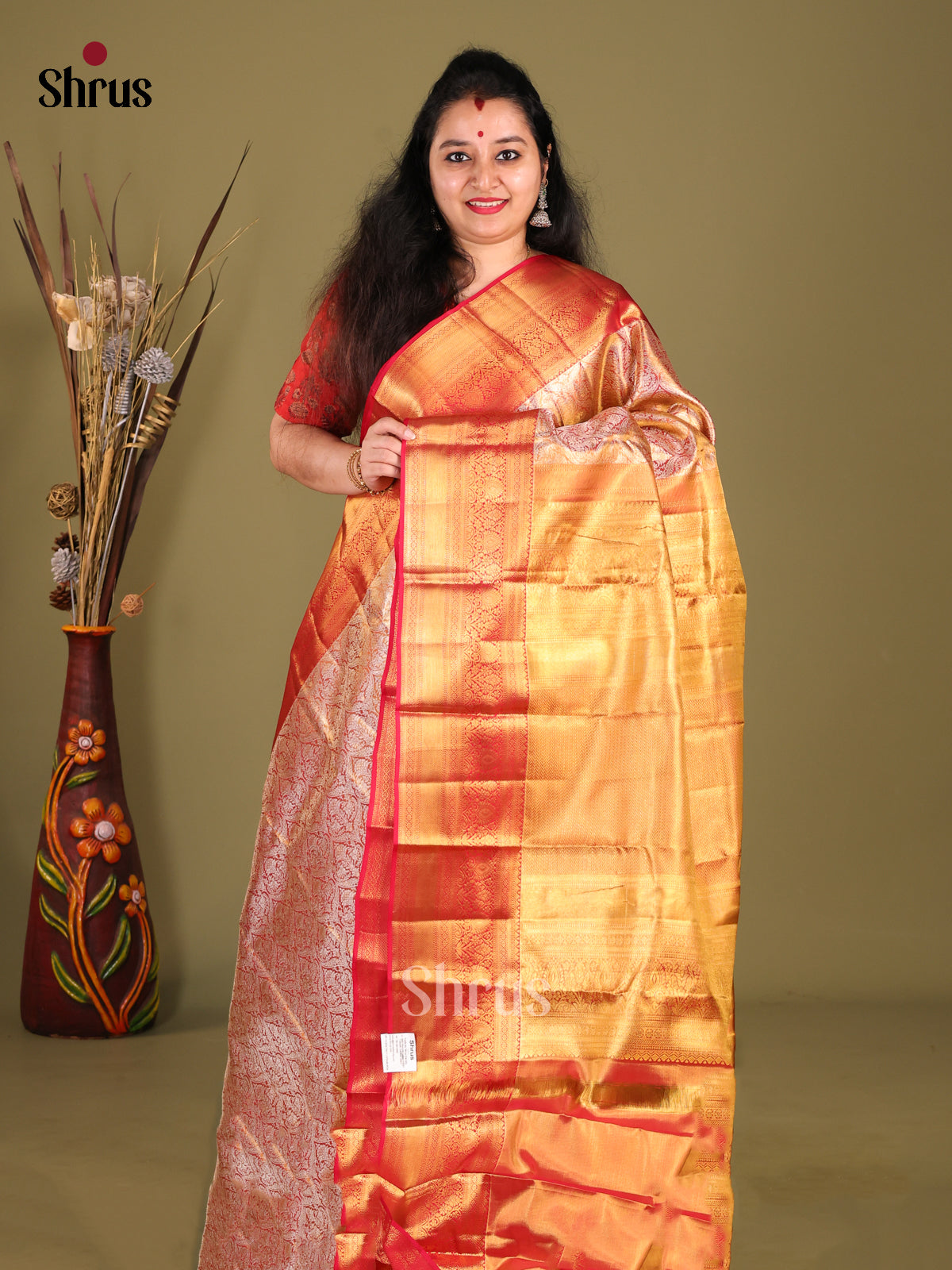 Exquisite Orange Kanjivaram Saree with Red Zari Border & A Grand Golden Pallu