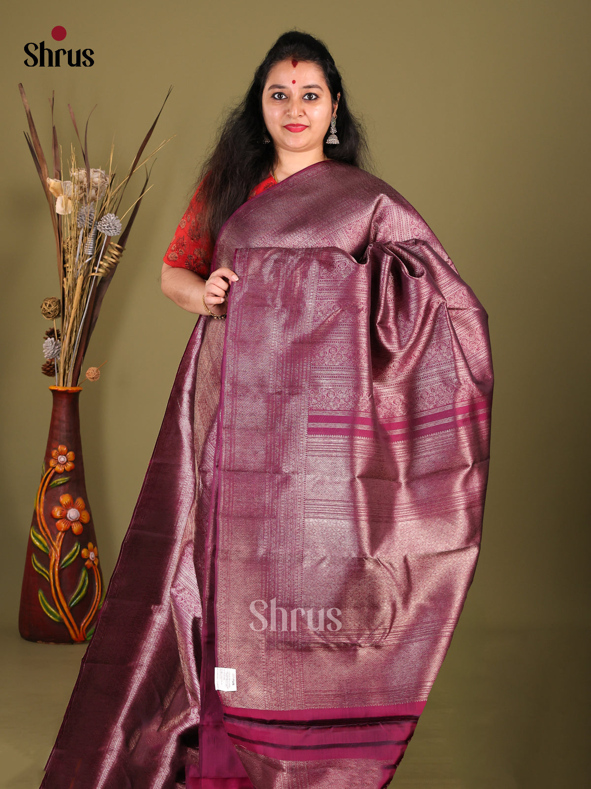 Opulent Maroon Kanchipuram silk Saree with rich zari Brocade Pattern