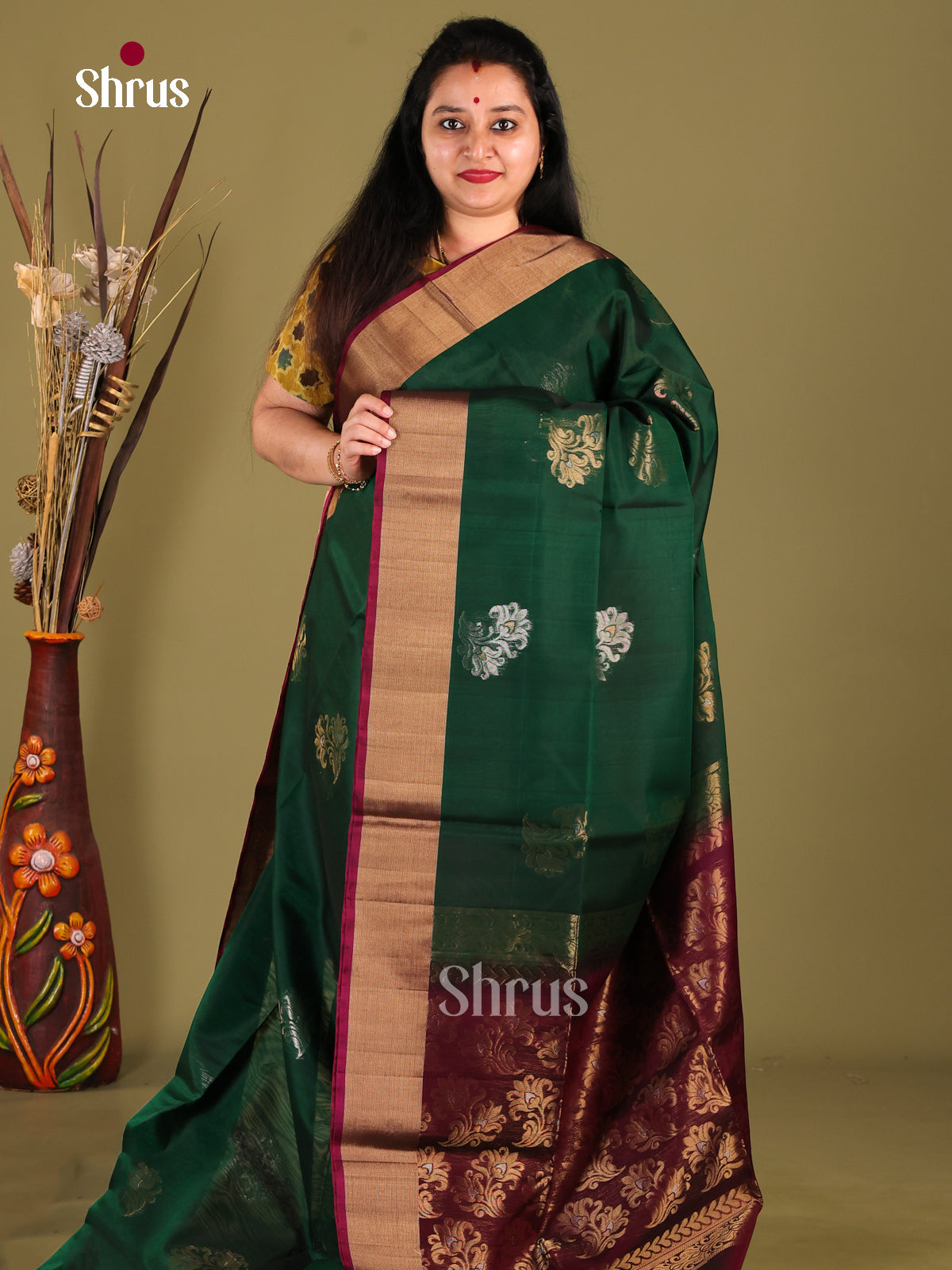 Elegant Green Silk Cotton Saree with Zari Floral Motifs & Maroon Pallu - Shop on Shrus.com