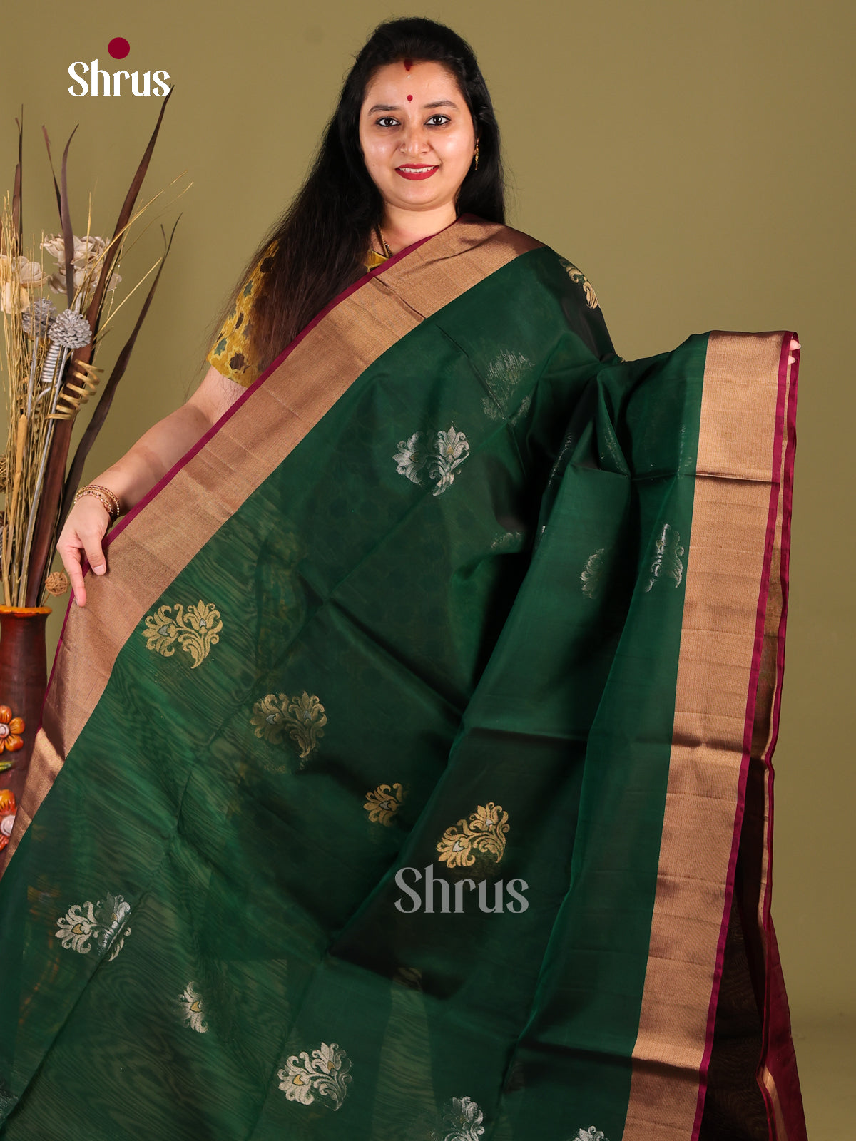 Elegant Green Silk Cotton Saree with Zari Floral Motifs & Maroon Pallu - Shop on Shrus.com