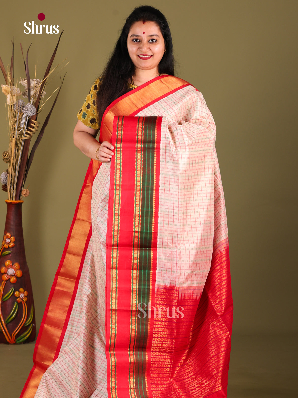 Elegant Cream Silk Cotton Saree With Zari Checks, Buttas & Red Rettaipet Border - Shop on Shrus.com