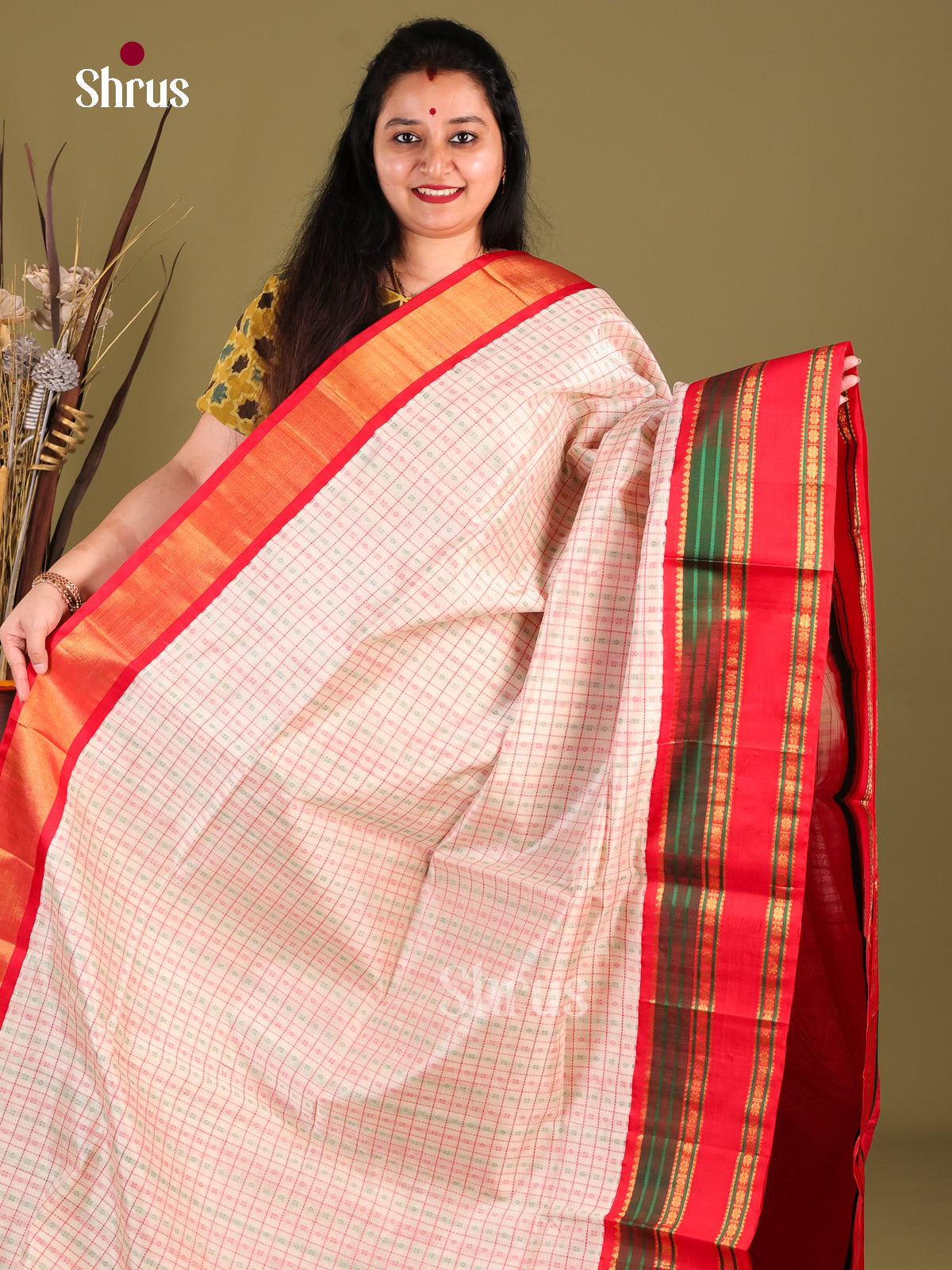 Elegant Cream Silk Cotton Saree With Zari Checks, Buttas & Red Rettaipet Border - Shop on Shrus.com