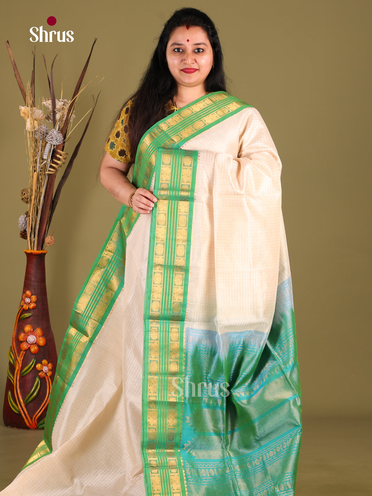 Timeless Cream Silk Cotton Saree With Zari Kattams & Teal Korvai Rettaipet Border
