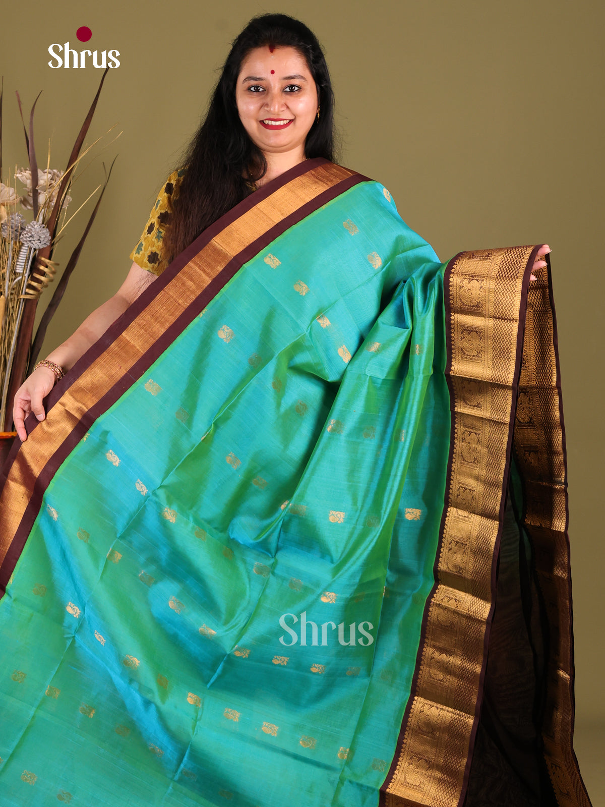 Serene Green Silk Cotton Saree with Zari Peacock Buttas & Korvai Border - Shop on Shrus.com