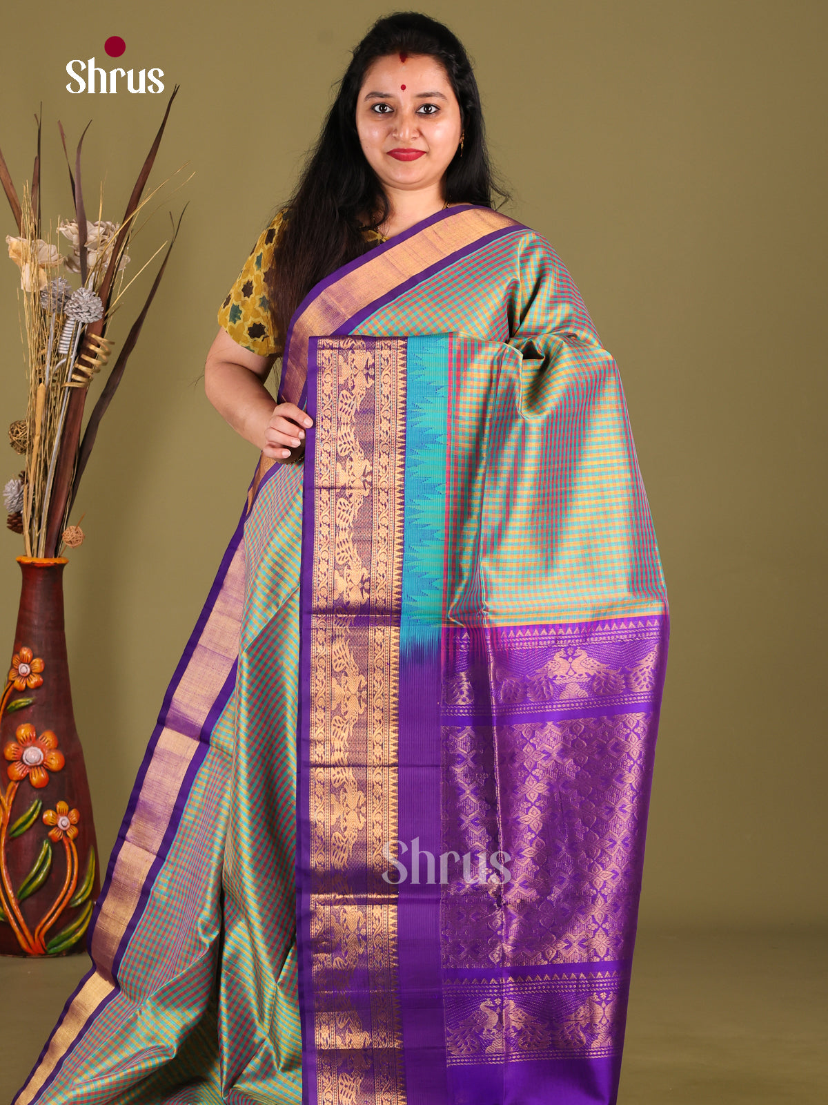 Pretty Green Silk Cotton Saree With Checks & Violet Korvai Zari Border
