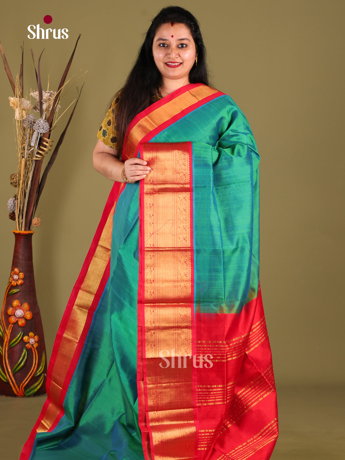 Lovely Green Silk Cotton Saree With Red Zari Woven Border