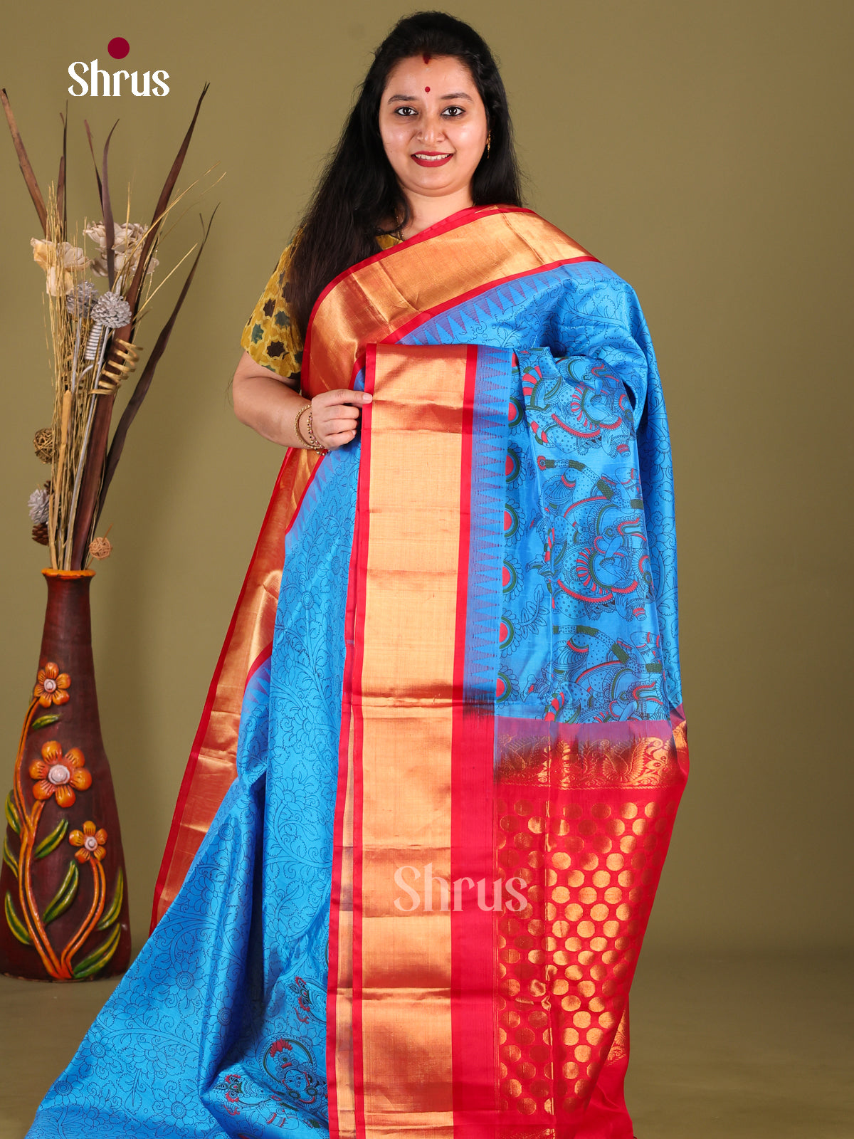 Classy Blue Silk Cotton Saree With Kalamkari Prints & Red Temple Border