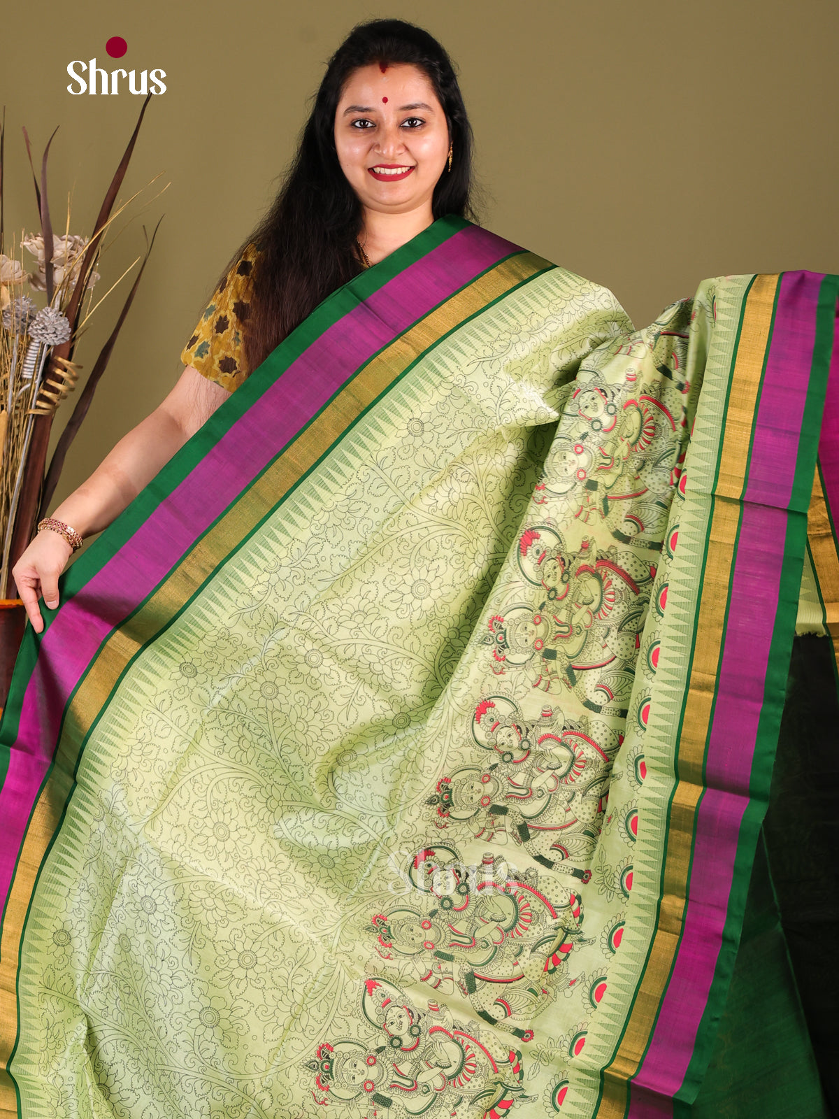 Classy Pista Green Silk Cotton Saree With Kalamkari Prints & Green Temple Border - Shop on Shrus.com