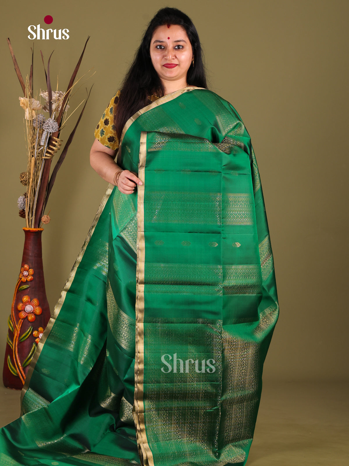 Elegant Green Soft Silk Saree with zari buttas, stripes & Rich Brocade Pallu