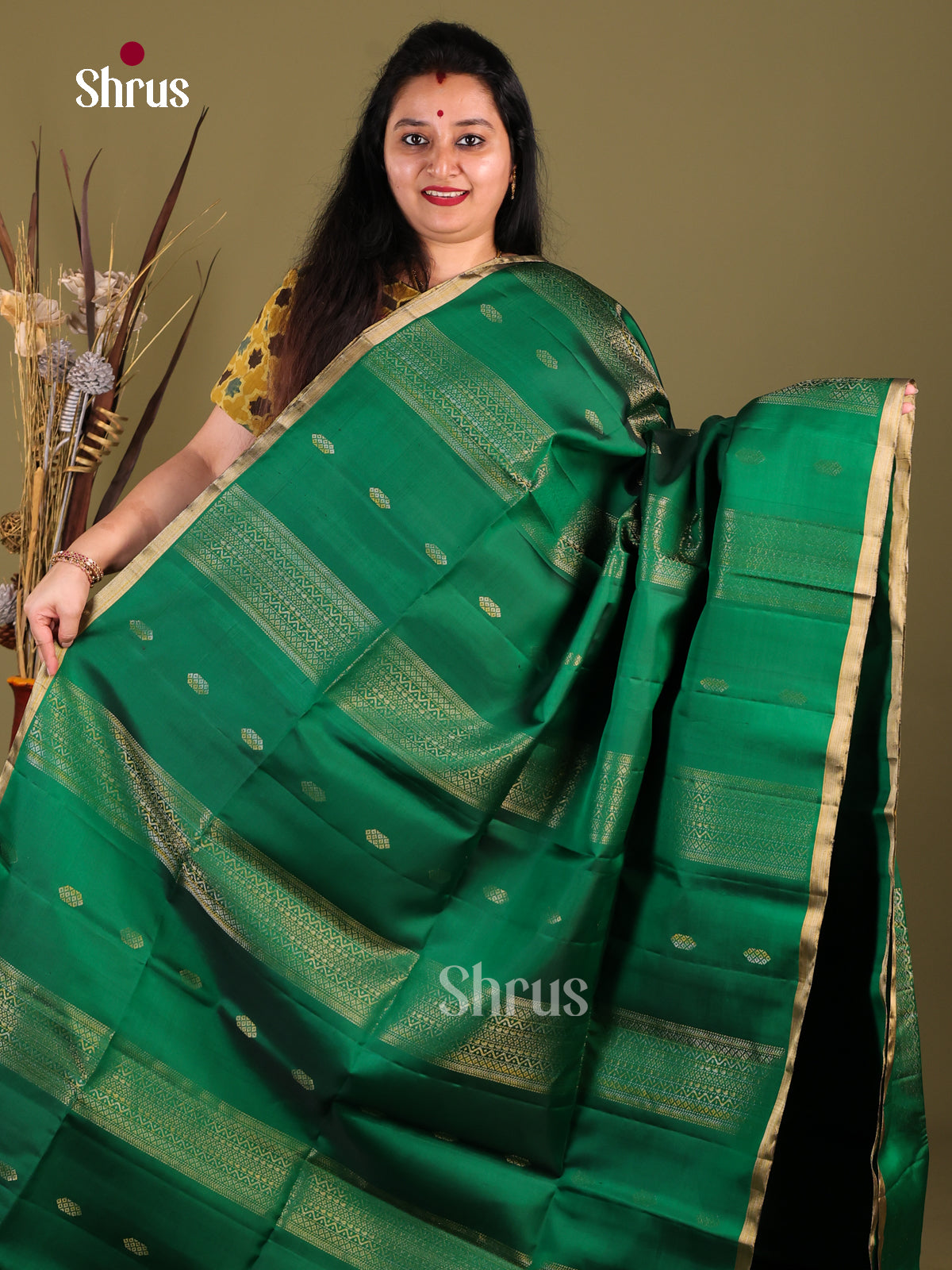 Elegant Green Soft Silk Saree with zari buttas, stripes & Rich Brocade Pallu -1