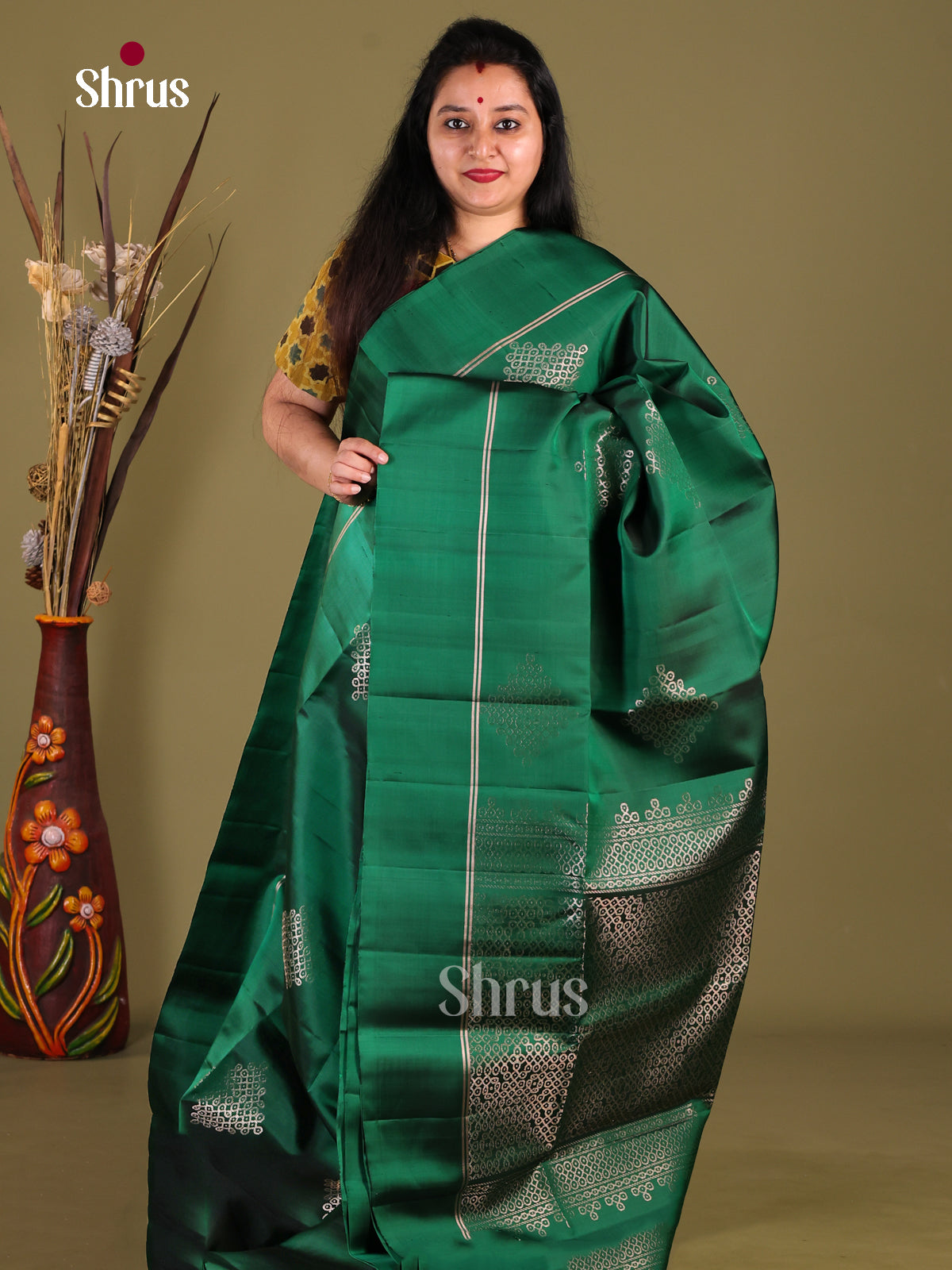Classy Dark Green Soft Silk Saree with zari kolam motifs & Brocade Pallu