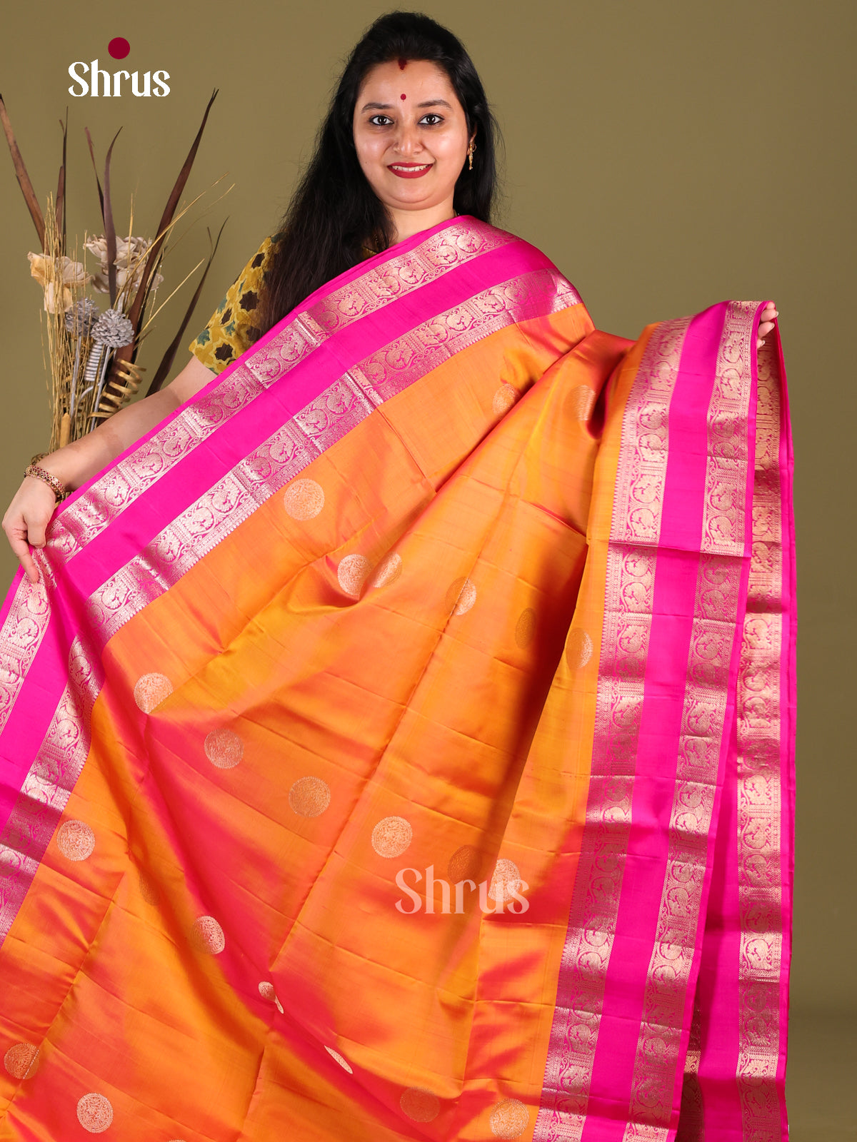 Opulent Orange Soft Silk Saree with Golden Buttas & Majenta rettaipet zari border - Shop on Shrus.com